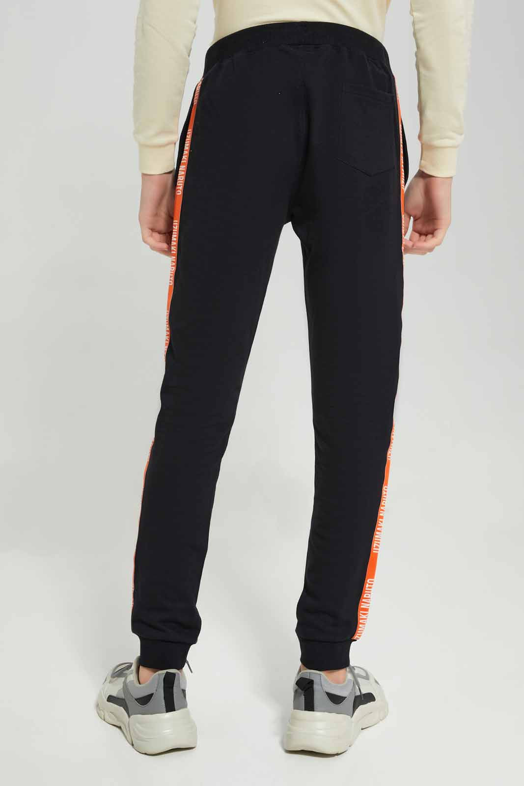 Redtag-Boys-Black-Naruto-Active-Pants-With-Slide-Tape-BSR-Joggers,-Category:Joggers,-Colour:Black,-Deals:New-In,-Filter:Senior-Boys-(8-to-14-Yrs),-New-In-BSR-APL,-Non-Sale,-Section:Boys-(0-to-14Yrs),-W22B-Senior-Boys-9 to 14 Years