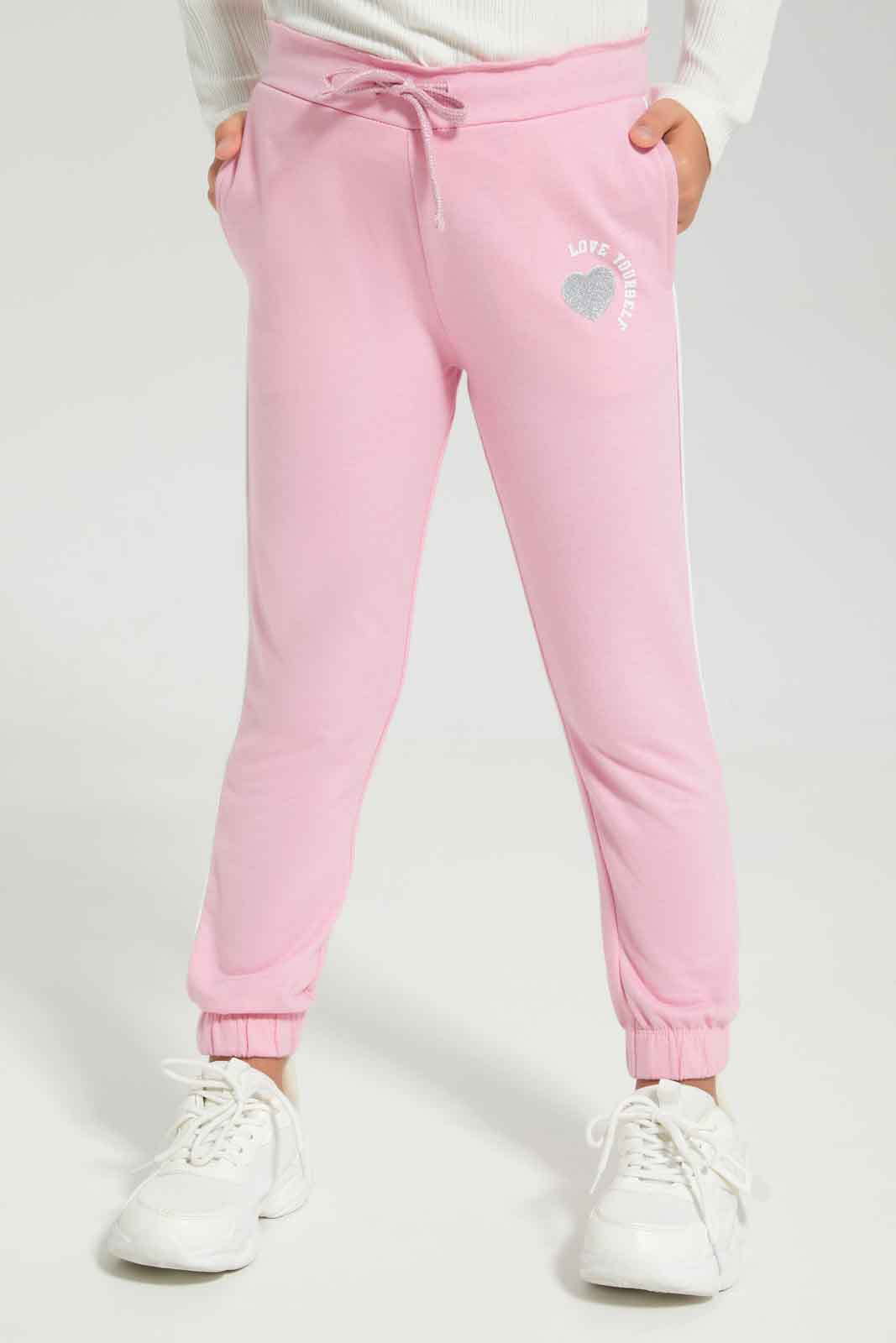 Redtag-Girls-Pale-Pink-Active-Pant-Category:Joggers,-Colour:Apricot,-Deals:New-In,-Dept:Girls,-Filter:Girls-(2-to-8-Yrs),-GIR-Joggers,-New-In-GIR-APL,-Non-Sale,-Section:Girls-(0-to-14Yrs),-W22A-Girls-2 to 8 Years