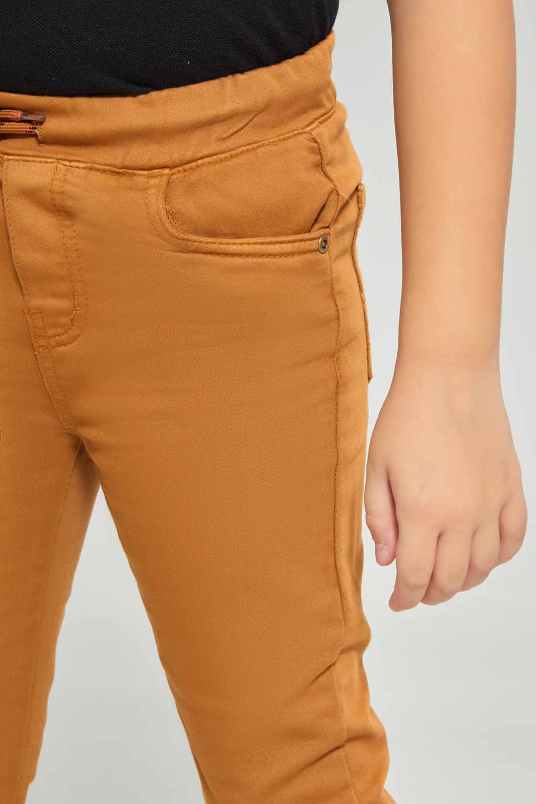 Redtag-Boys-Brown-Knit-Denim-Jogger-BOY-Jeans,-Category:Jeans,-Colour:Brown,-Deals:New-In,-Dept:Boys,-Filter:Boys-(2-to-8-Yrs),-New-In-BOY-APL,-Non-Sale,-Section:Boys-(0-to-14Yrs),-W22B-Boys-2 to 8 Years