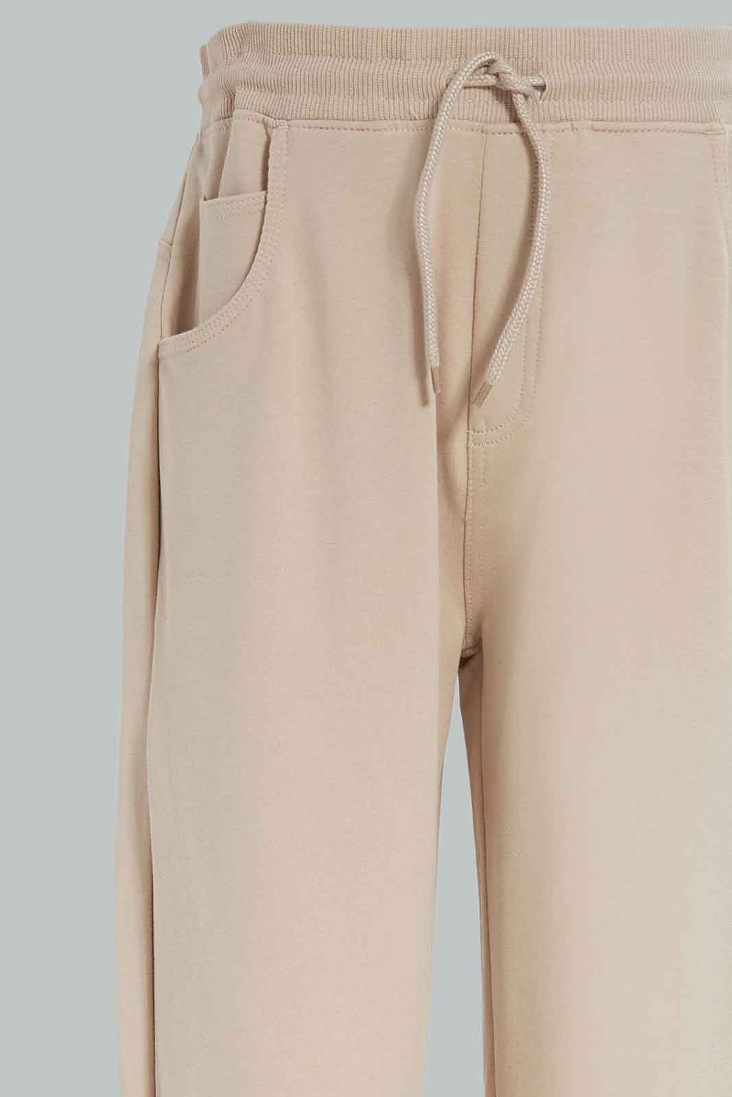 Redtag-Boys-Beige-Stretch-Active-Pants-BSR-Joggers,-Category:Joggers,-Colour:Beige,-Deals:New-In,-Dept:Boys,-Filter:Senior-Boys-(8-to-14-Yrs),-New-In-BSR-APL,-Non-Sale,-Section:Boys-(0-to-14Yrs),-VLM,-W22B-Senior-Boys-9 to 14 Years