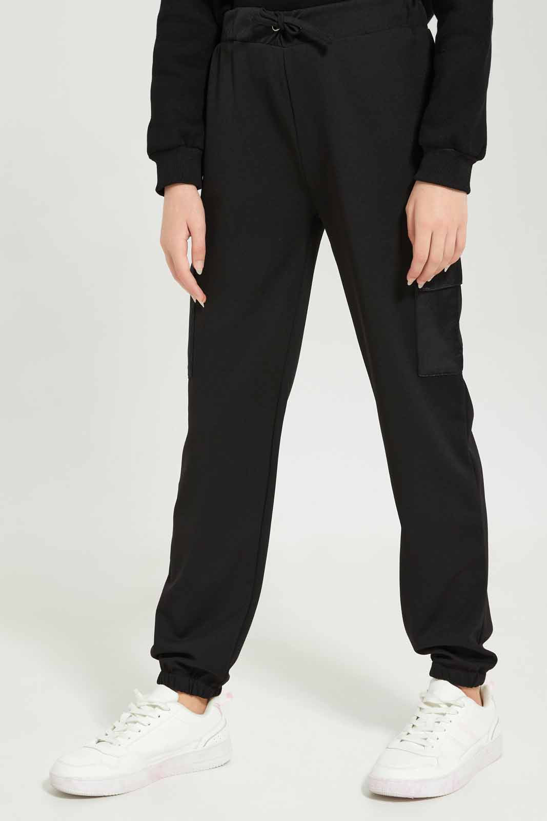 Redtag-Girls-Black-Cargo-Pocket-Pants-Category:Joggers,-Colour:Black,-Deals:New-In,-Dept:Girls,-Filter:Senior-Girls-(8-to-14-Yrs),-GSR-Joggers,-New-In-GSR-APL,-Non-Sale,-Section:Girls-(0-to-14Yrs),-W22A-Senior-Girls-