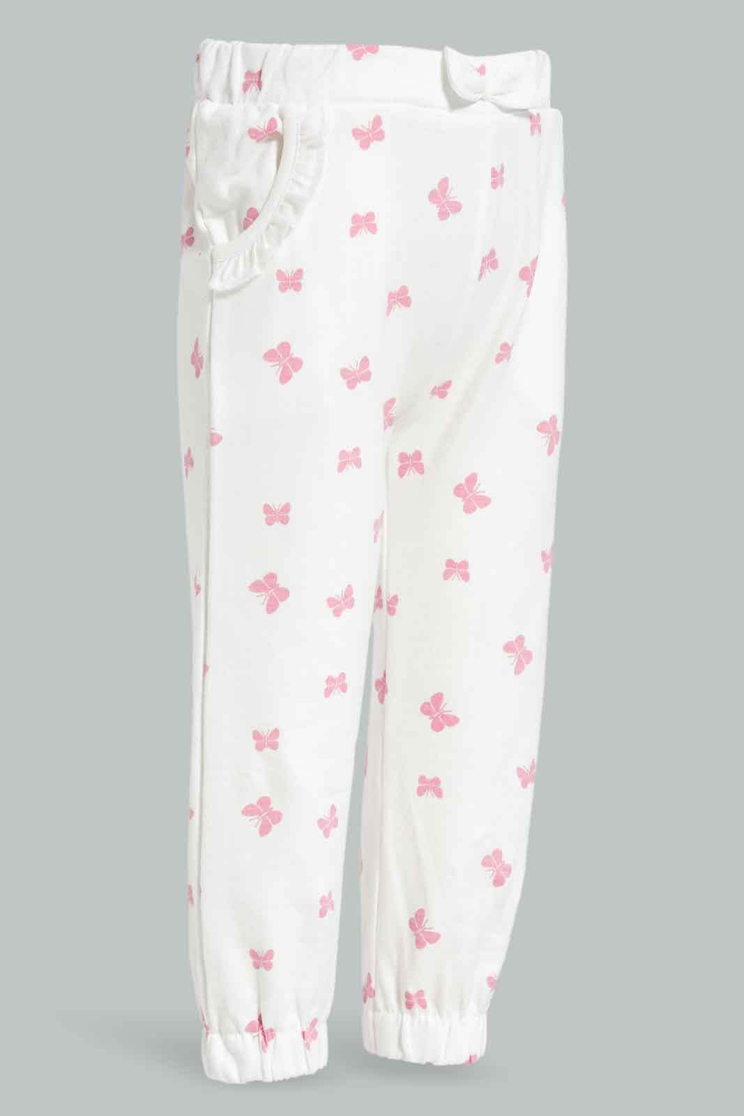 Redtag-Girls-Lvory-With-Dusty-Pink-Aop-Active-Pant-Category:Joggers,-Colour:Ivory,-Deals:New-In,-Filter:Infant-Girls-(3-to-24-Mths),-ING-Joggers,-New-In-ING-APL,-Non-Sale,-Section:Girls-(0-to-14Yrs),-W22B-Infant-Girls-3 to 24 Months