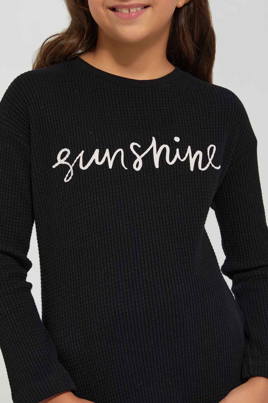 Redtag-Girls-Black-Waffle-T-Shirt-With-Placment-Print-Category:T-Shirts,-Colour:Black,-Deals:New-In,-Filter:Girls-(2-to-8-Yrs),-GIR-T-Shirts,-New-In-GIR-APL,-Non-Sale,-Section:Girls-(0-to-14Yrs),-W22B-Girls-2 to 8 Years