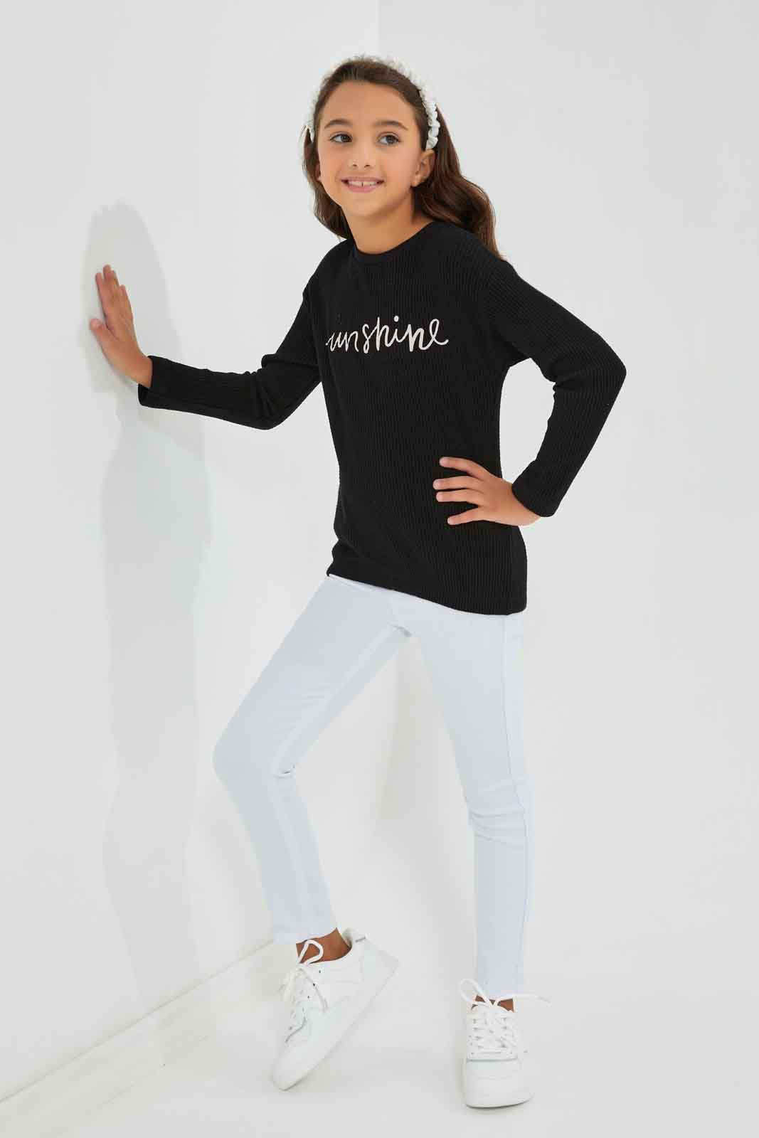 Redtag-Girls-Black-Waffle-T-Shirt-With-Placment-Print-Category:T-Shirts,-Colour:Black,-Deals:New-In,-Filter:Girls-(2-to-8-Yrs),-GIR-T-Shirts,-New-In-GIR-APL,-Non-Sale,-Section:Girls-(0-to-14Yrs),-W22B-Girls-2 to 8 Years