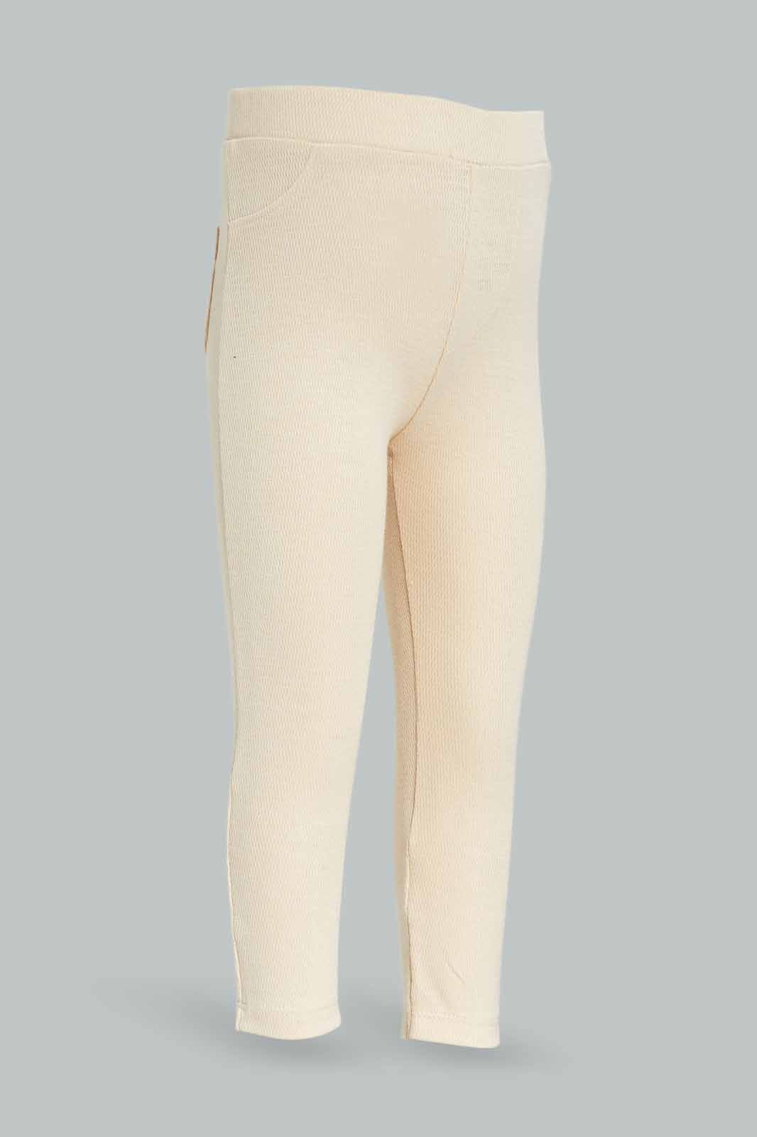 Redtag-Girls-Beige-Knitted-Jegging-Category:Jeggings,-Colour:Beige,-Deals:New-In,-Dept:Girls,-Filter:Infant-Girls-(3-to-24-Mths),-ING-Jeggings,-New-In-ING-APL,-Non-Sale,-S23A,-Section:Girls-(0-to-14Yrs),-VLM-Infant-Girls-3 to 24 Months