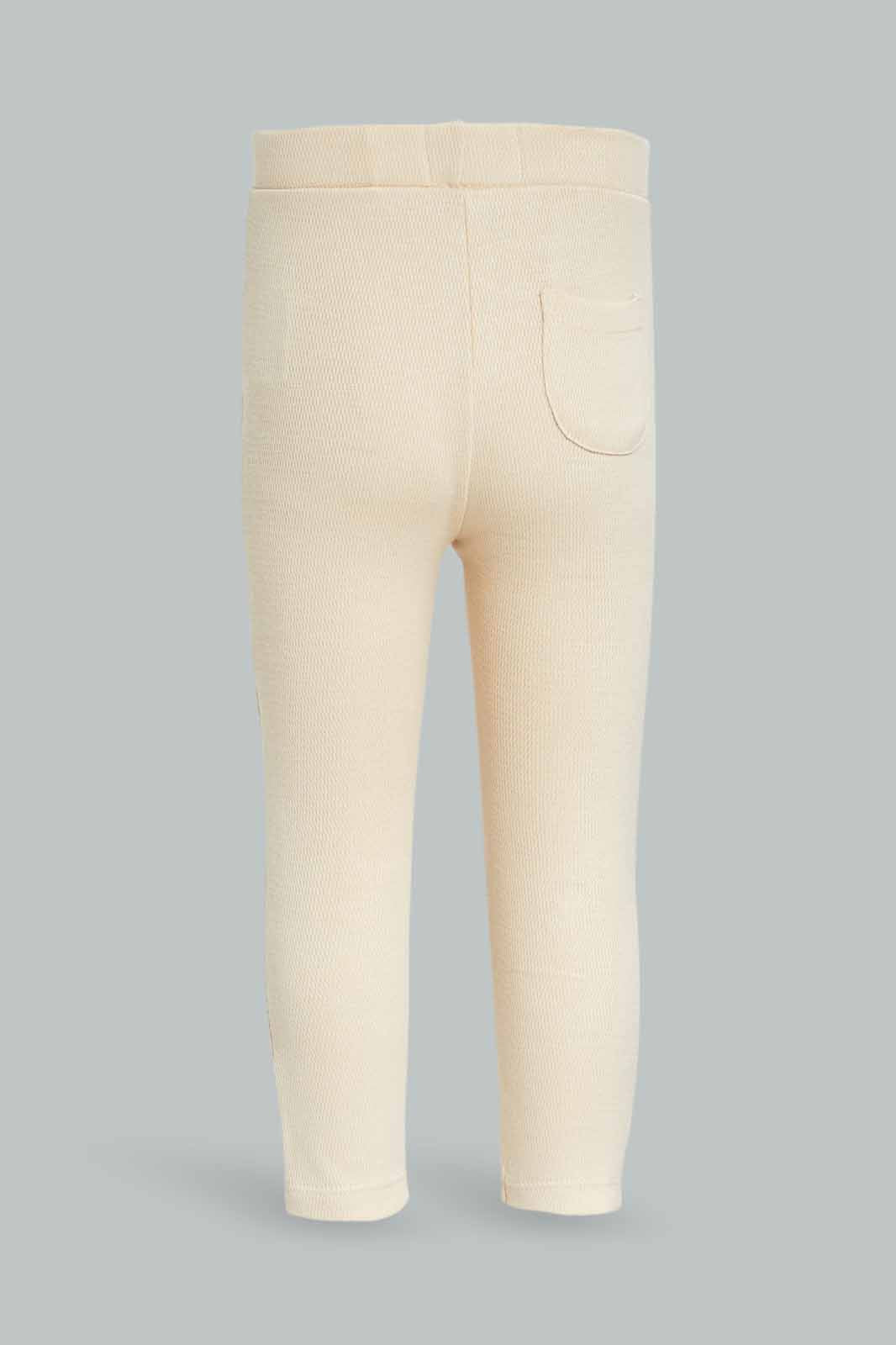 Redtag-Girls-Beige-Knitted-Jegging-Category:Jeggings,-Colour:Beige,-Deals:New-In,-Dept:Girls,-Filter:Infant-Girls-(3-to-24-Mths),-ING-Jeggings,-New-In-ING-APL,-Non-Sale,-S23A,-Section:Girls-(0-to-14Yrs),-VLM-Infant-Girls-3 to 24 Months