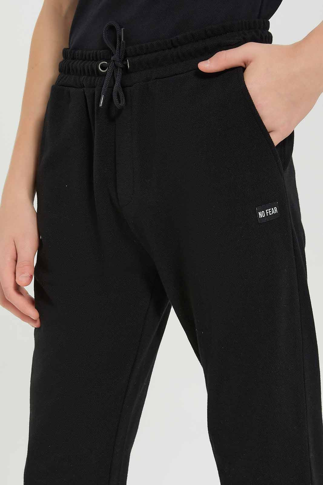 Redtag-Boys-Black-Pique-Active-Pants-BSR-Joggers,-Category:Joggers,-Colour:Black,-Deals:New-In,-Dept:Boys,-Filter:Senior-Boys-(8-to-14-Yrs),-New-In-BSR-APL,-Non-Sale,-S23A,-Section:Boys-(0-to-14Yrs),-TBL-Senior-Boys-9 to 14 Years