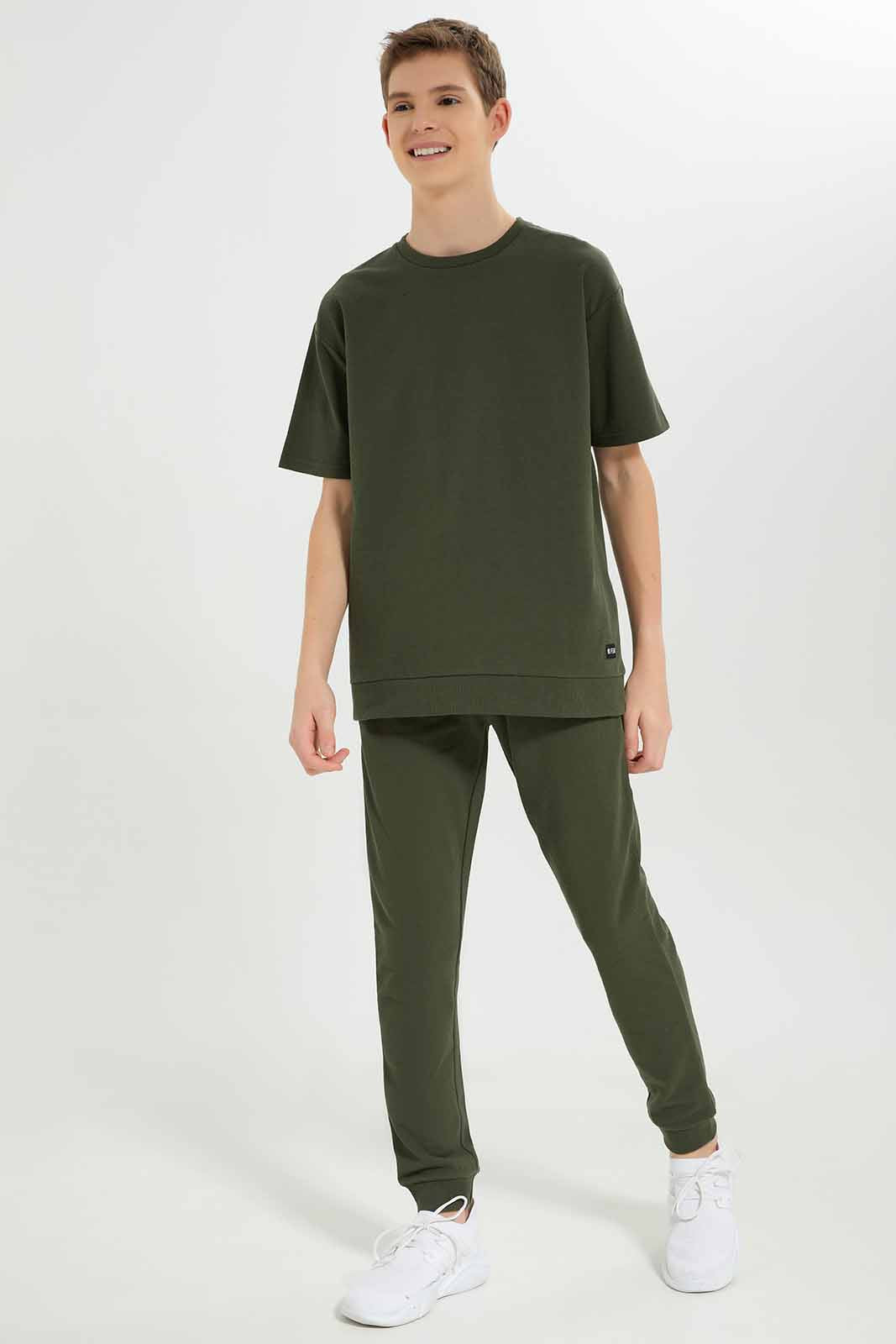 Redtag-Boys-Olive-Pique-Active-Pants-BSR-Joggers,-Category:Joggers,-Colour:Green,-Deals:New-In,-Dept:Boys,-Filter:Senior-Boys-(8-to-14-Yrs),-New-In-BSR-APL,-Non-Sale,-S23A,-Section:Boys-(0-to-14Yrs),-TBL-Senior-Boys-9 to 14 Years