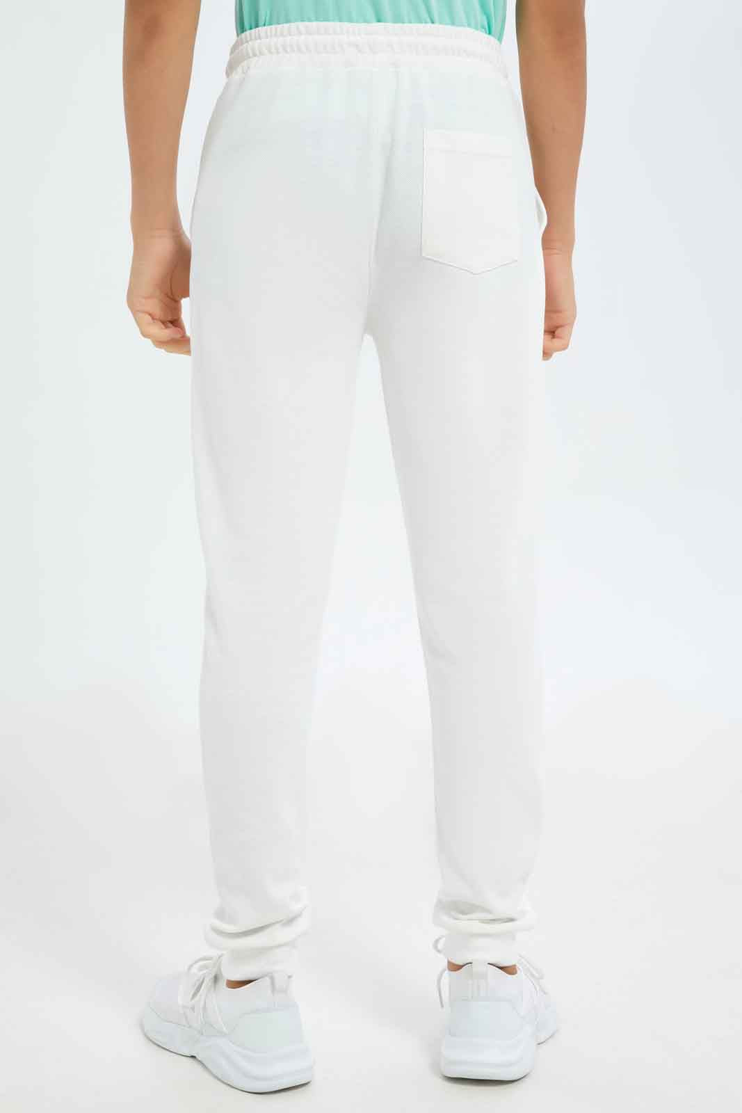 Redtag-Boys-White-Pique-Active-Pants-BSR-Joggers,-Category:Joggers,-Colour:White,-Deals:New-In,-Dept:Boys,-Filter:Senior-Boys-(8-to-14-Yrs),-New-In-BSR-APL,-Non-Sale,-S23A,-Section:Boys-(0-to-14Yrs),-TBL-Senior-Boys-9 to 14 Years