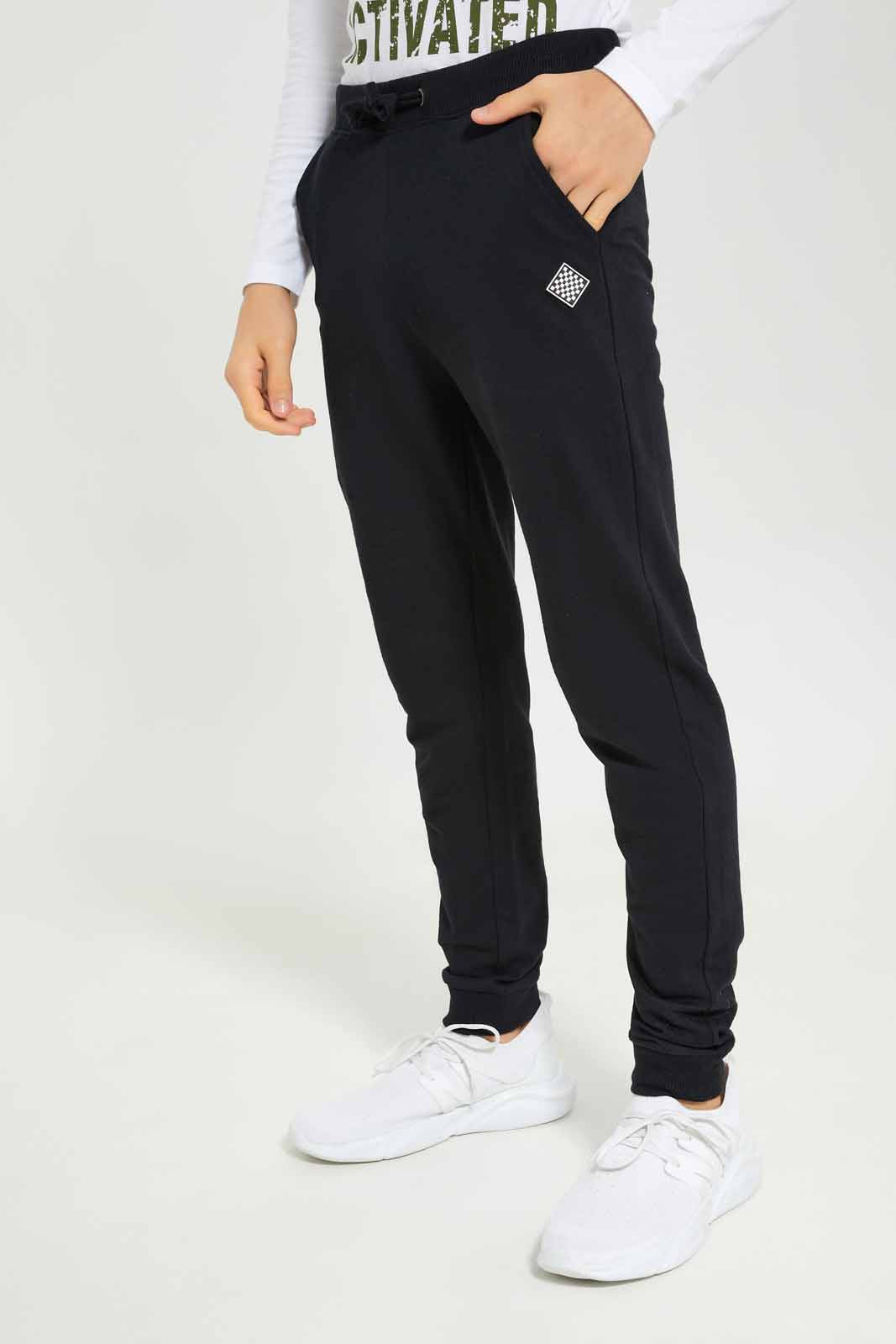 Redtag-Boys-Black-Table-Active-Pants-BSR-Joggers,-Category:Joggers,-Colour:Black,-Deals:New-In,-Dept:Boys,-Filter:Senior-Boys-(8-to-14-Yrs),-New-In-BSR-APL,-Non-Sale,-S23A,-Section:Boys-(0-to-14Yrs),-TBL-Senior-Boys-9 to 14 Years
