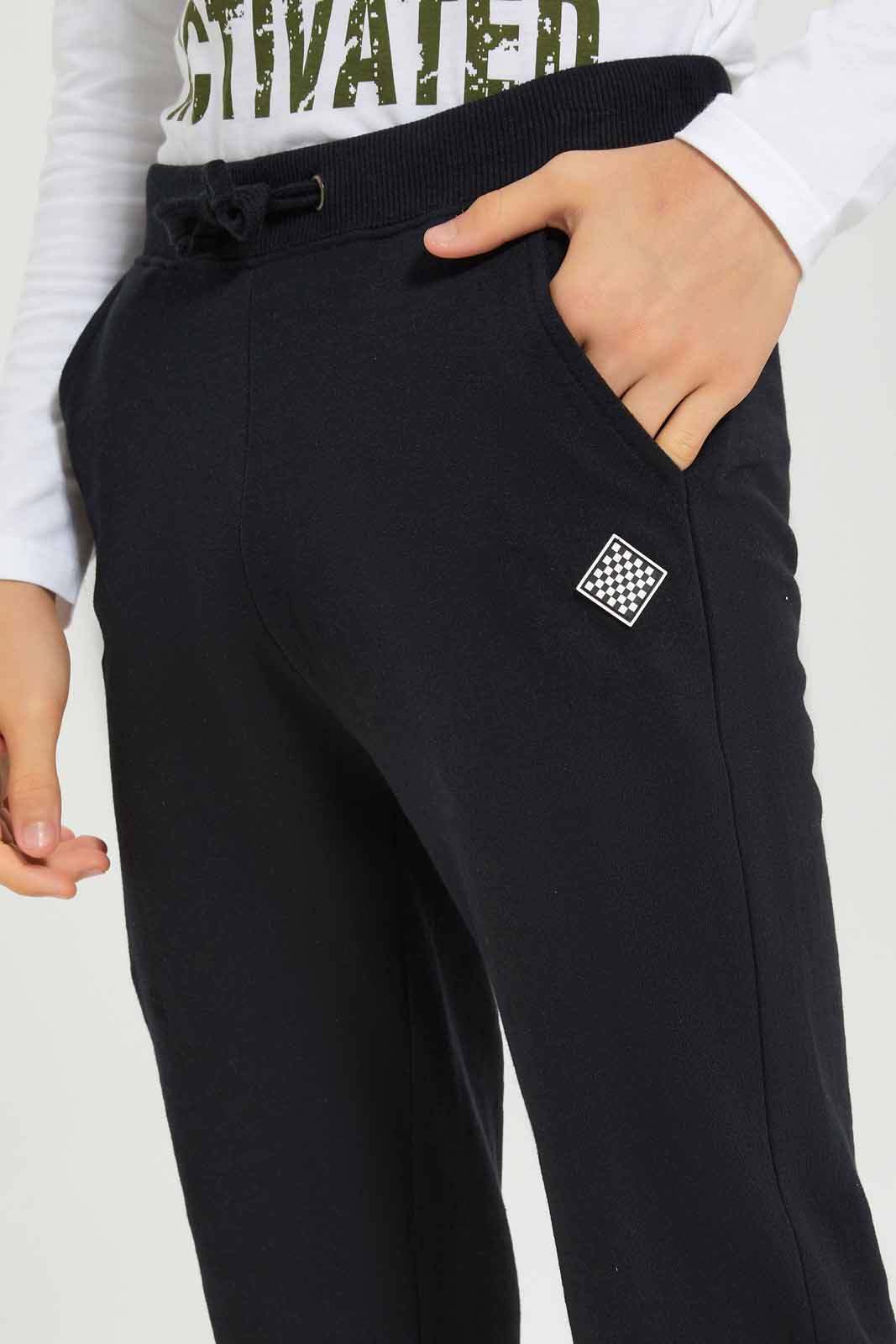 Redtag-Boys-Black-Table-Active-Pants-BSR-Joggers,-Category:Joggers,-Colour:Black,-Deals:New-In,-Dept:Boys,-Filter:Senior-Boys-(8-to-14-Yrs),-New-In-BSR-APL,-Non-Sale,-S23A,-Section:Boys-(0-to-14Yrs),-TBL-Senior-Boys-9 to 14 Years
