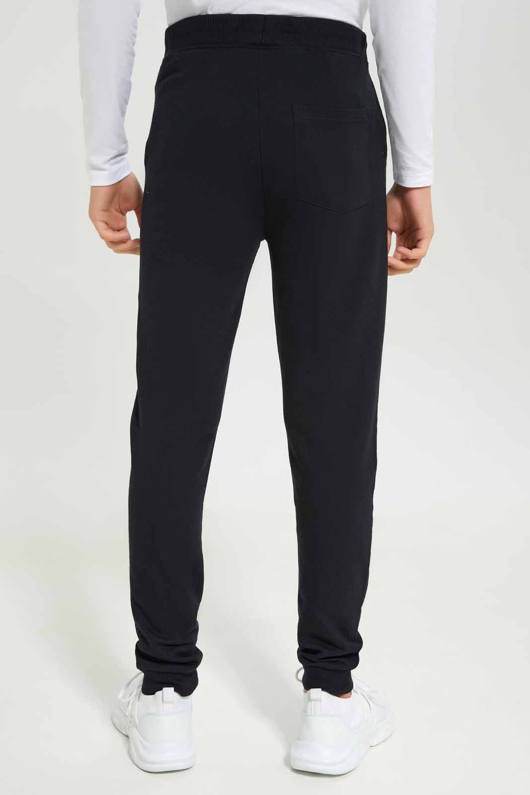 Redtag-Boys-Black-Table-Active-Pants-BSR-Joggers,-Category:Joggers,-Colour:Black,-Deals:New-In,-Dept:Boys,-Filter:Senior-Boys-(8-to-14-Yrs),-New-In-BSR-APL,-Non-Sale,-S23A,-Section:Boys-(0-to-14Yrs),-TBL-Senior-Boys-9 to 14 Years