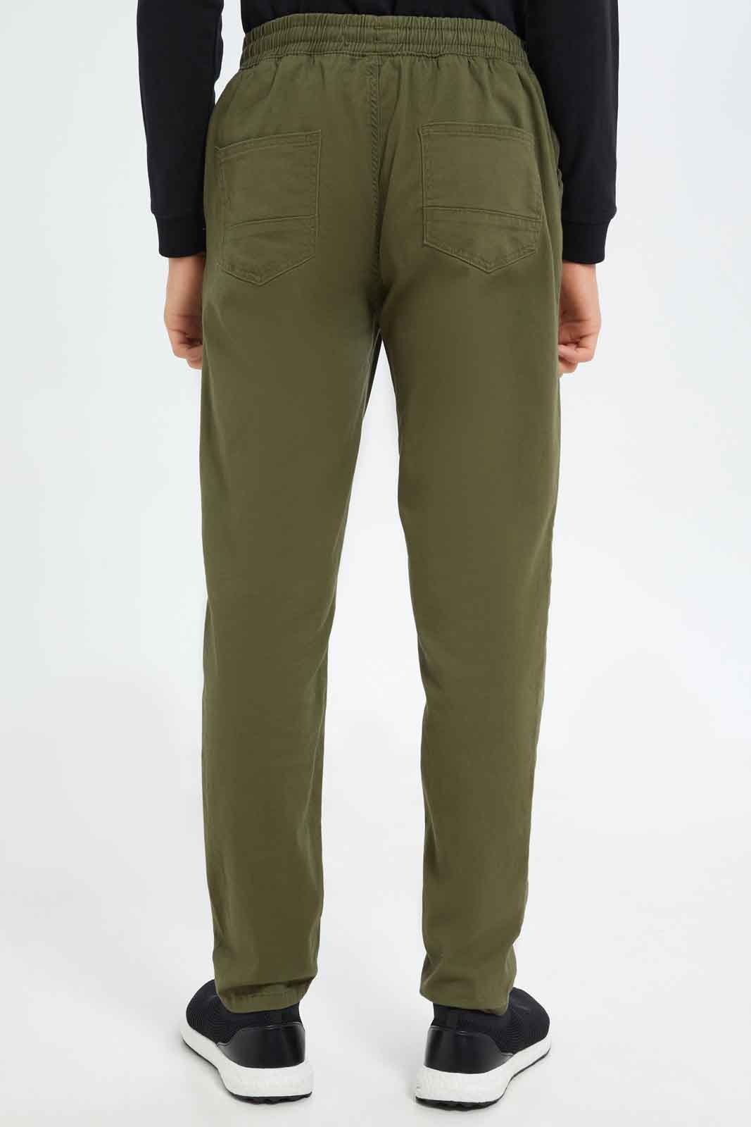 Redtag-Boys-Olive-Pull-On-Casual-Trouser-BSR-Trousers,-Category:Trousers,-Colour:Olive,-Deals:New-In,-Dept:Boys,-Filter:Senior-Boys-(8-to-14-Yrs),-New-In-BSR-APL,-Non-Sale,-S23A,-Section:Boys-(0-to-14Yrs),-TBL-Senior-Boys-9 to 14 Years