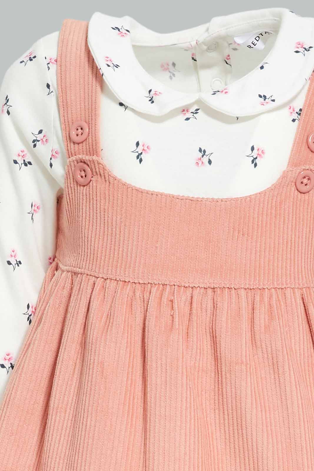 Redtag-Girls-Dusty-Pink-Dungree-Dress-With-Ivory-Aop-T-Shirt-Category:Sets,-Colour:Apricot,-Deals:New-In,-Dept:Girls,-Filter:Infant-Girls-(3-to-24-Mths),-ING-Sets,-New-In-ING-APL,-Non-Sale,-Section:Girls-(0-to-14Yrs),-W22B-Infant-Girls-3 to 24 Months