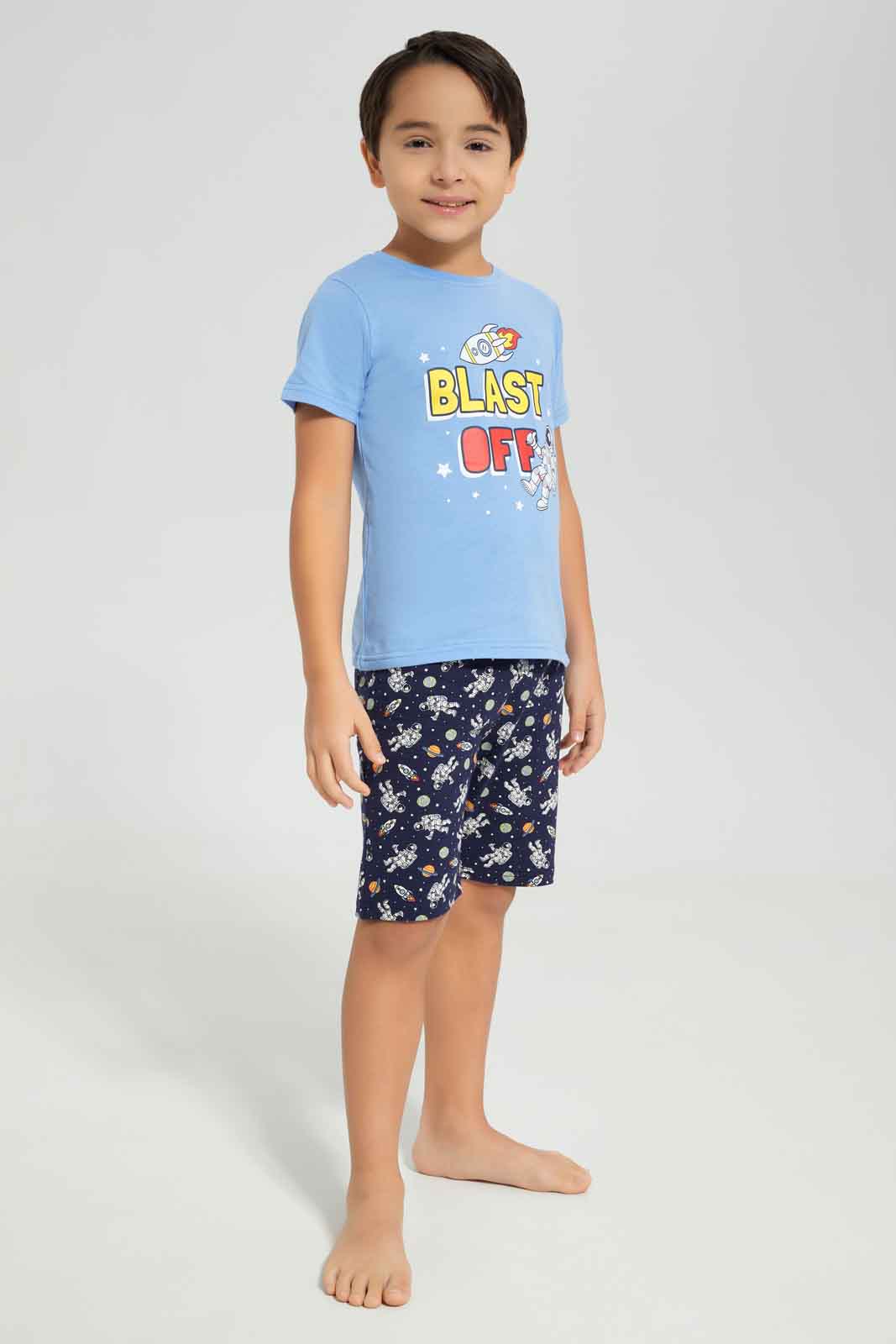 Redtag-Boys-Blue-Space-Short-Sleeve-Graphic-Tee-And-Aop-Shorts-Pyjama-Set-BOY-Pyjama-Sets,-Category:Pyjama-Sets,-Colour:Blue,-Deals:New-In,-Dept:Boys,-Filter:Boys-(2-to-8-Yrs),-New-In-BOY-APL,-Non-Sale,-S23A,-Section:Boys-(0-to-14Yrs),-VLM-Boys-2 to 8 Years