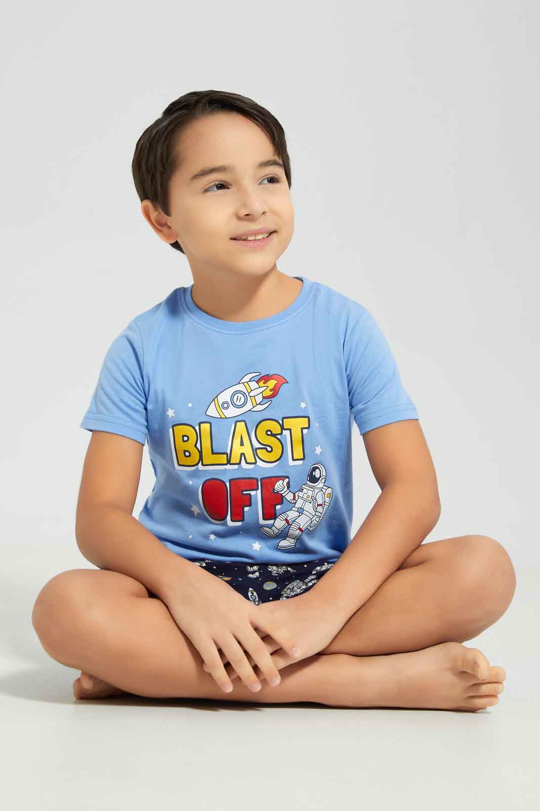 Redtag-Boys-Blue-Space-Short-Sleeve-Graphic-Tee-And-Aop-Shorts-Pyjama-Set-BOY-Pyjama-Sets,-Category:Pyjama-Sets,-Colour:Blue,-Deals:New-In,-Dept:Boys,-Filter:Boys-(2-to-8-Yrs),-New-In-BOY-APL,-Non-Sale,-S23A,-Section:Boys-(0-to-14Yrs),-VLM-Boys-2 to 8 Years