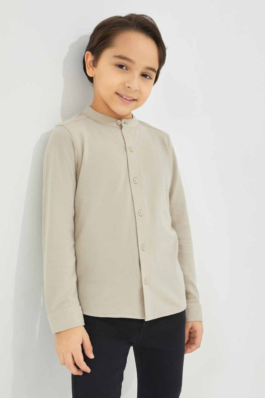 Redtag-Boys-Stone-Long-Sleeve-Pique-Shirt-BOY-Shirts,-Category:Shirts,-Colour:Beige,-Deals:New-In,-Dept:Boys,-Filter:Boys-(2-to-8-Yrs),-New-In-BOY-APL,-Non-Sale,-S23A,-Section:Boys-(0-to-14Yrs),-TBL-Boys-2 to 8 Years