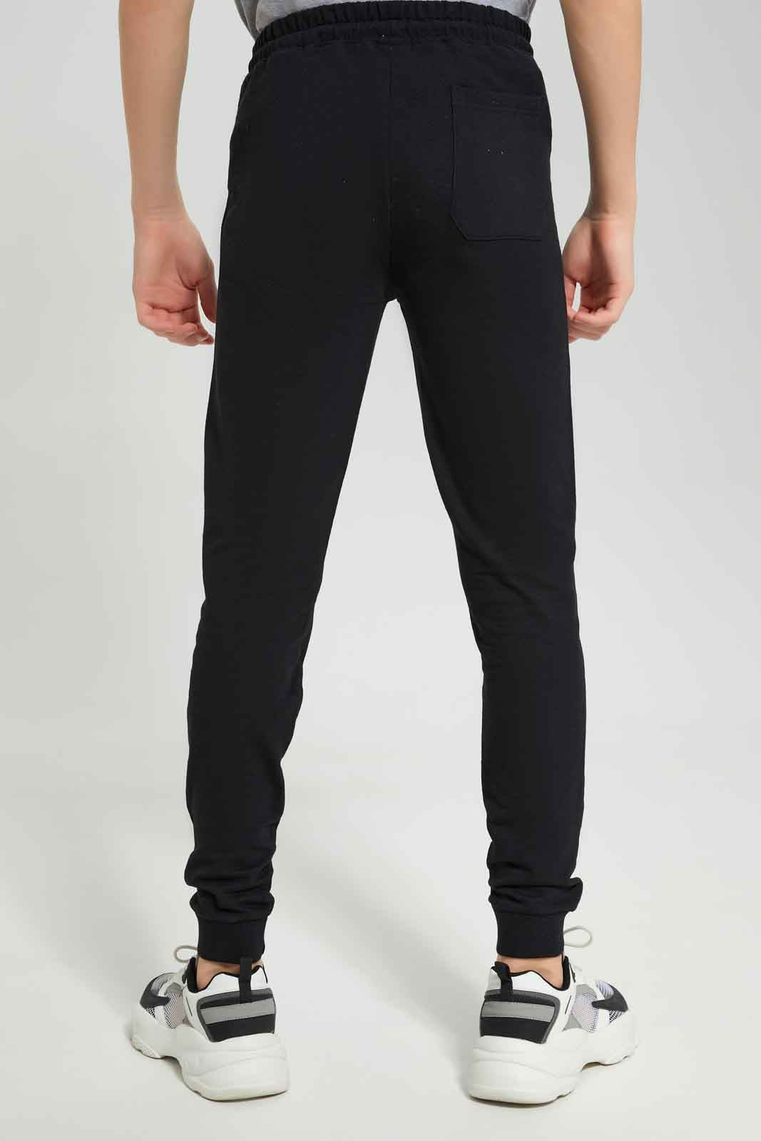 Redtag-Boys-Black-Heatseal-Zip-Active-Pants-BSR-Joggers,-Category:Joggers,-Colour:Black,-Deals:New-In,-Dept:Boys,-Filter:Senior-Boys-(8-to-14-Yrs),-New-In-BSR-APL,-Non-Sale,-Section:Boys-(0-to-14Yrs),-W22B-Senior-Boys-9 to 14 Years