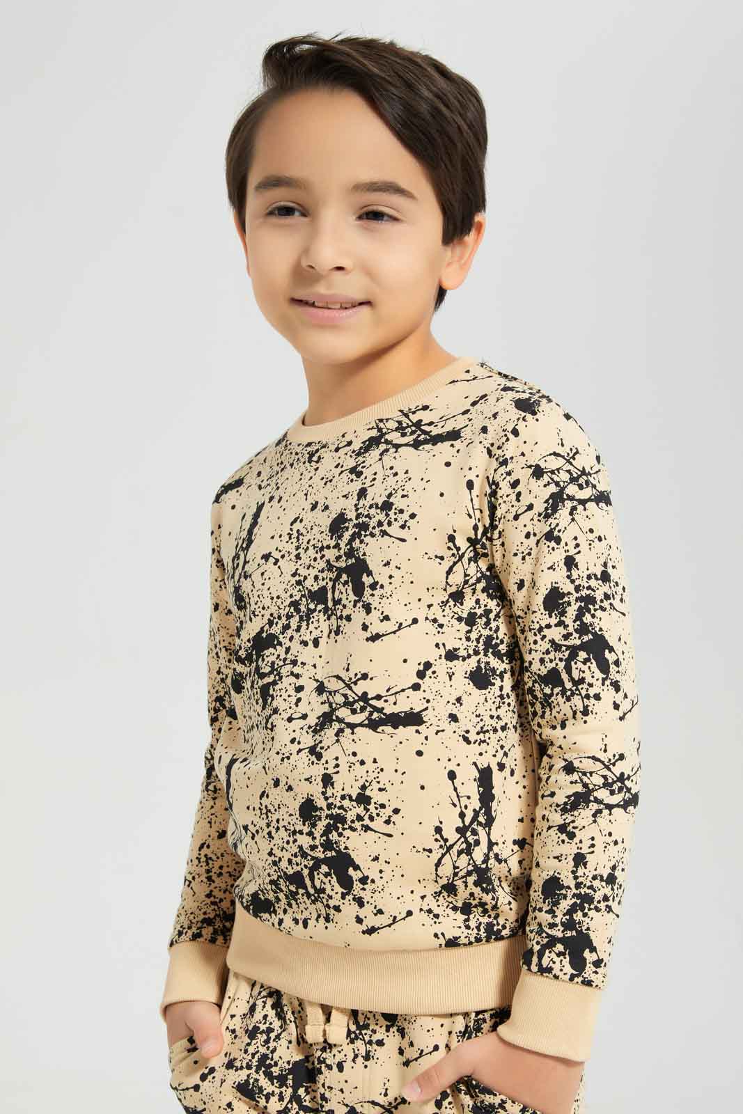 Redtag-Boys-Beige-Splat-Print-Crew-Neck-Jogsuit-BOY-Jog-Sets,-Category:Jog-Sets,-Colour:Beige,-Deals:New-In,-Dept:Boys,-Filter:Boys-(2-to-8-Yrs),-New-In-BOY-APL,-Non-Sale,-S23A,-Section:Boys-(0-to-14Yrs)-Boys-2 to 8 Years