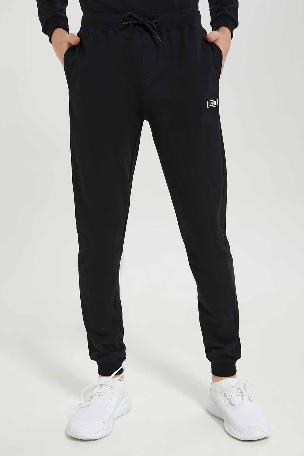 Redtag-Boys-Black-Lounge-Wear-Active-Pants-BSR-Joggers,-Category:Joggers,-Colour:Black,-Deals:New-In,-Dept:Boys,-Filter:Senior-Boys-(8-to-14-Yrs),-New-In-BSR-APL,-Non-Sale,-S23A,-Section:Boys-(0-to-14Yrs)-Senior-Boys-9 to 14 Years