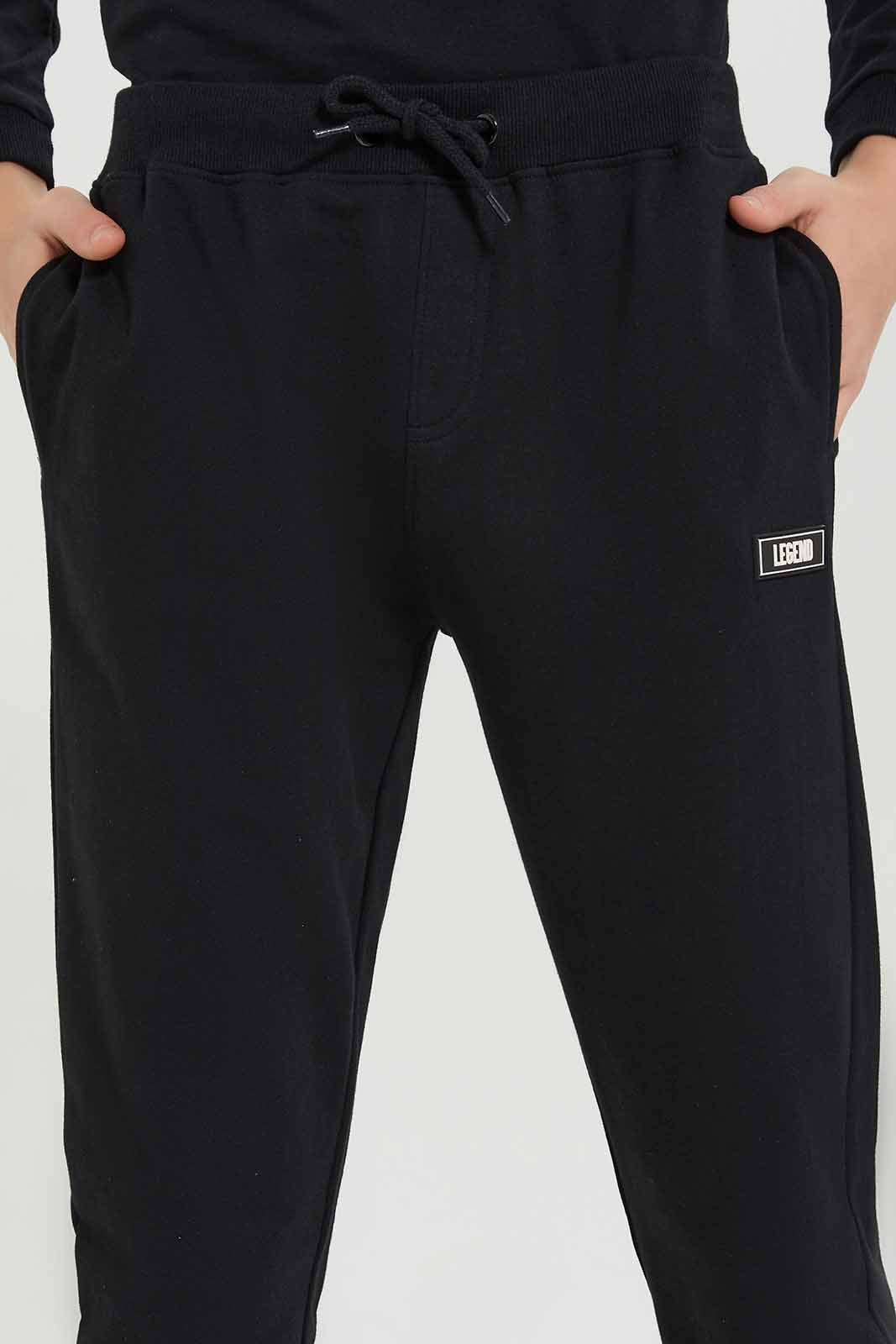 Redtag-Boys-Black-Lounge-Wear-Active-Pants-BSR-Joggers,-Category:Joggers,-Colour:Black,-Deals:New-In,-Dept:Boys,-Filter:Senior-Boys-(8-to-14-Yrs),-New-In-BSR-APL,-Non-Sale,-S23A,-Section:Boys-(0-to-14Yrs)-Senior-Boys-9 to 14 Years