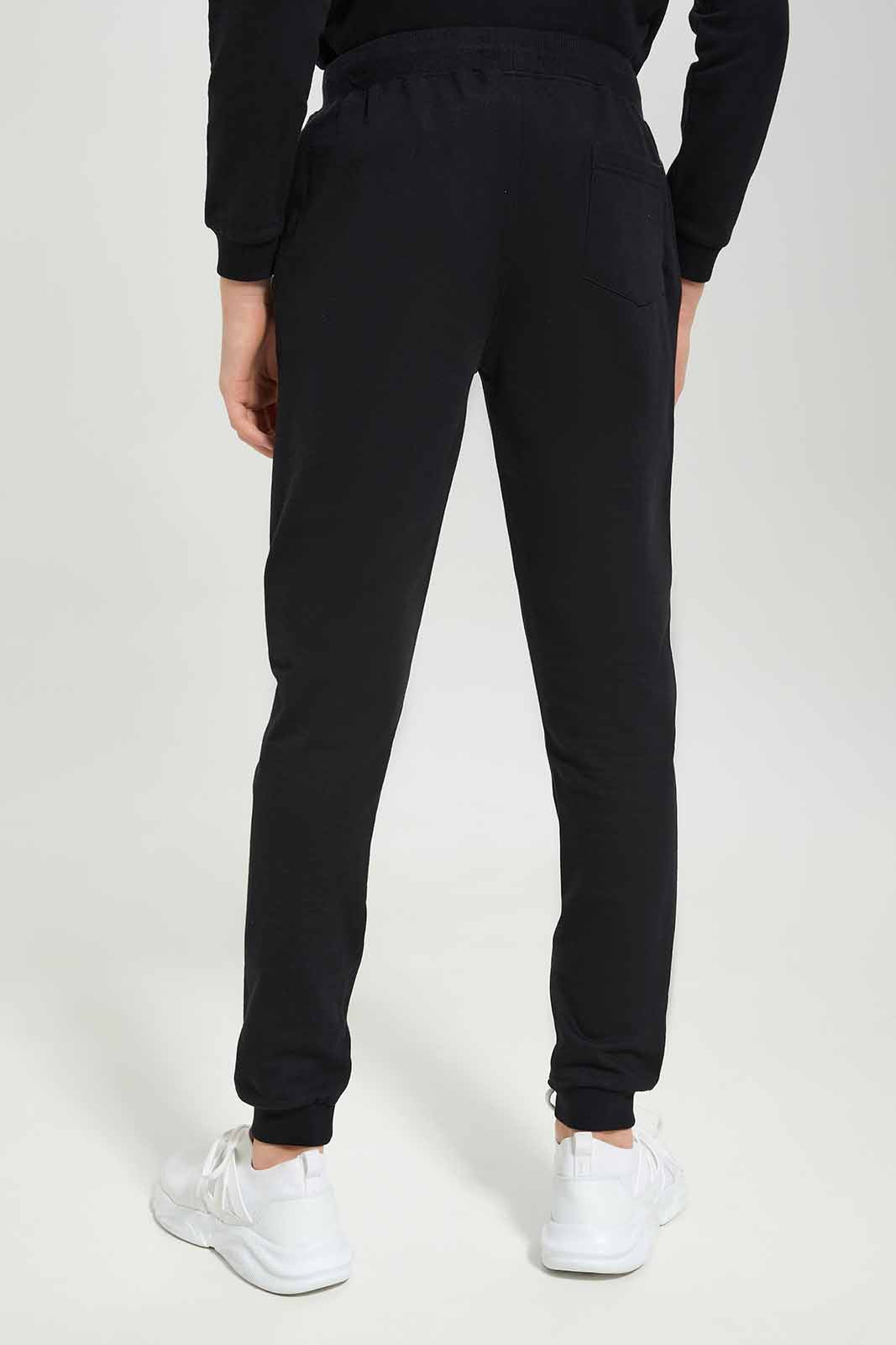 Redtag-Boys-Black-Lounge-Wear-Active-Pants-BSR-Joggers,-Category:Joggers,-Colour:Black,-Deals:New-In,-Dept:Boys,-Filter:Senior-Boys-(8-to-14-Yrs),-New-In-BSR-APL,-Non-Sale,-S23A,-Section:Boys-(0-to-14Yrs)-Senior-Boys-9 to 14 Years