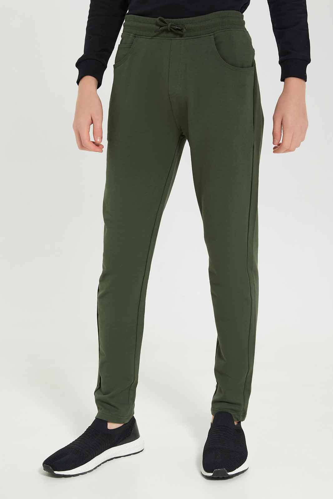 Redtag-Boys-Olive-Stretch-Active-Pants-BSR-Joggers,-Category:Joggers,-Colour:Olive,-Deals:New-In,-Dept:Boys,-Filter:Senior-Boys-(8-to-14-Yrs),-New-In-BSR-APL,-Non-Sale,-S23A,-Section:Boys-(0-to-14Yrs),-VLM-Senior-Boys-9 to 14 Years