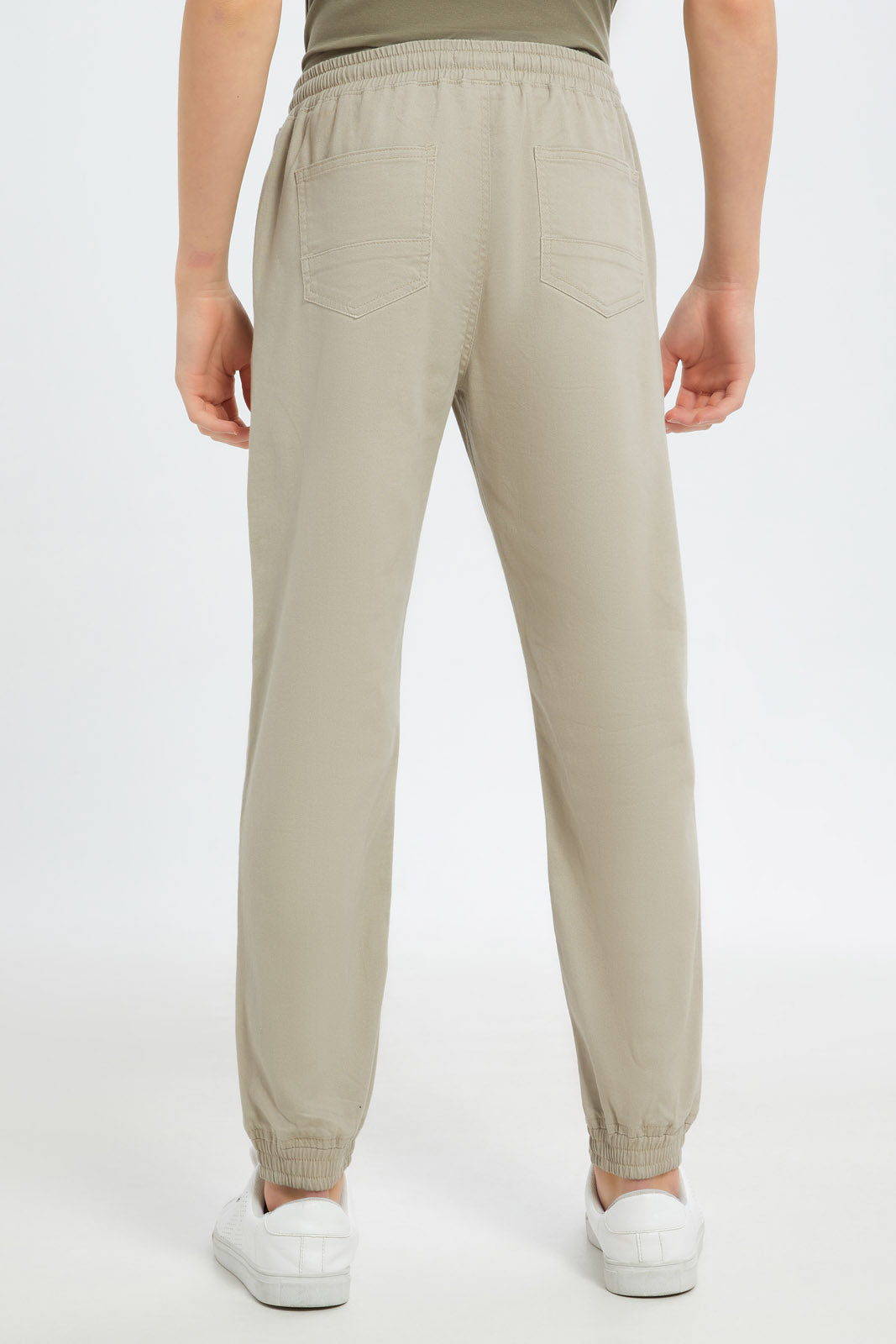 Redtag-Boys-Beige-Pull-On-Jogger-BSR-Trousers,-Category:Trousers,-Colour:Beige,-Deals:2-FOR-89,-Deals:New-In,-Dept:Boys,-Filter:Senior-Boys-(8-to-14-Yrs),-H1:KWR,-H2:BSR,-H3:TRS,-H4:CTR,-New-In-BSR-APL,-Non-Sale,-S23B,-Season:S23B,-Section:Boys-(0-to-14Yrs),-TBL-Senior-Boys-9 to 14 Years