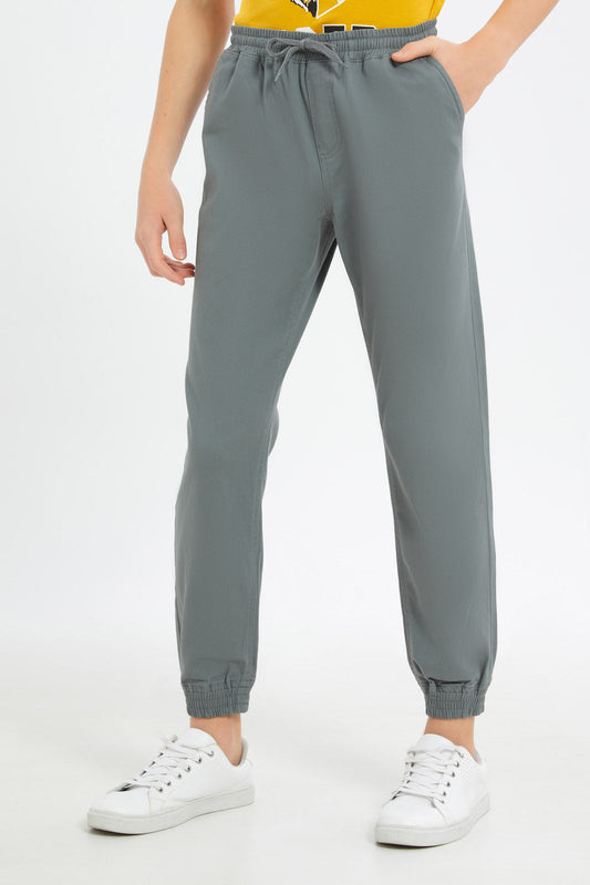 Redtag-Boys-Grey-Pull-On-Jogger-BSR-Trousers,-Category:Trousers,-Colour:Grey,-Deals:2-FOR-89,-Deals:New-In,-Dept:Boys,-Filter:Senior-Boys-(8-to-14-Yrs),-H1:KWR,-H2:BSR,-H3:TRS,-H4:CTR,-New-In-BSR-APL,-Non-Sale,-S23B,-Season:S23B,-Section:Boys-(0-to-14Yrs),-TBL-Senior-Boys-9 to 14 Years