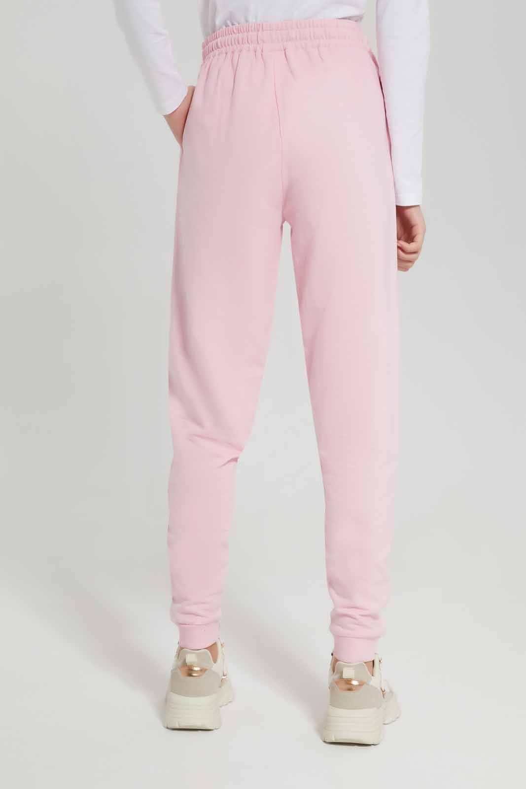 Redtag-Girls-Pale-Pink-Basic-Track-Pants-Category:Joggers,-Colour:Apricot,-Deals:New-In,-Dept:Girls,-Filter:Senior-Girls-(8-to-14-Yrs),-GSR-Joggers,-New-In-GSR-APL,-Non-Sale,-S23A,-Section:Girls-(0-to-14Yrs),-TBL-Senior-Girls-9 to 14 Years