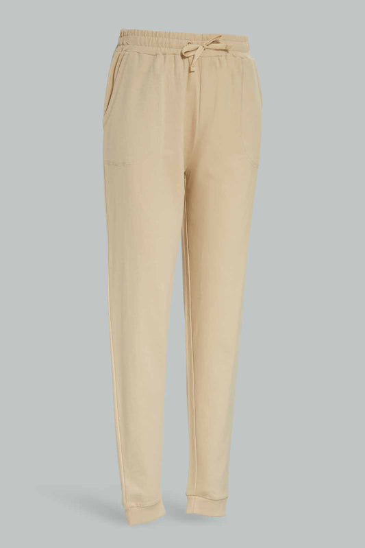 Redtag-Girls-Beige-Basic-Track-Pants-Category:Joggers,-Colour:Beige,-Deals:New-In,-Dept:Girls,-Filter:Senior-Girls-(8-to-14-Yrs),-GSR-Joggers,-New-In-GSR-APL,-Non-Sale,-S23A,-Section:Girls-(0-to-14Yrs),-TBL-Senior-Girls-9 to 14 Years