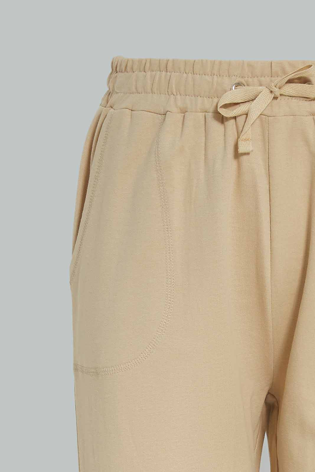 Redtag-Girls-Beige-Basic-Track-Pants-Category:Joggers,-Colour:Beige,-Deals:New-In,-Dept:Girls,-Filter:Senior-Girls-(8-to-14-Yrs),-GSR-Joggers,-New-In-GSR-APL,-Non-Sale,-S23A,-Section:Girls-(0-to-14Yrs),-TBL-Senior-Girls-9 to 14 Years