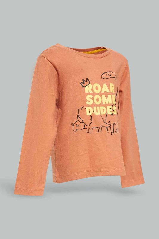 Redtag-Boys-Rust-Dino-Roar-Some-Dude-Ls-T-Shirt-Category:T-Shirts,-Colour:Tan,-Deals:New-In,-Dept:Boys,-Filter:Infant-Boys-(3-to-24-Mths),-INB-T-Shirts,-New-In-INB-APL,-Non-Sale,-S23A,-Section:Boys-(0-to-14Yrs),-TBL-Infant-Boys-3 to 24 Months