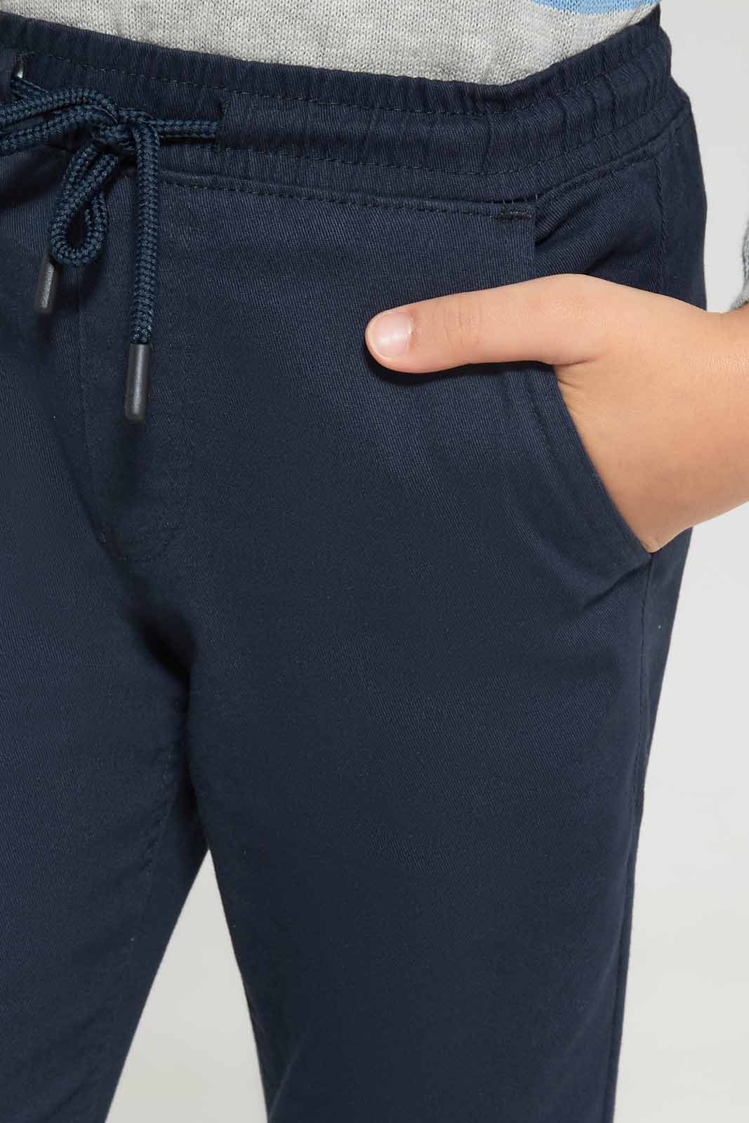 Redtag-Boys-Navy-Elasticated-Waist-Jogger-BOY-Trousers,-Category:Trousers,-Colour:Navy,-Deals:New-In,-Dept:Boys,-Filter:Boys-(2-to-8-Yrs),-New-In-BOY-APL,-Non-Sale,-S23A,-Section:Boys-(0-to-14Yrs),-VLM-Boys-2 to 8 Years