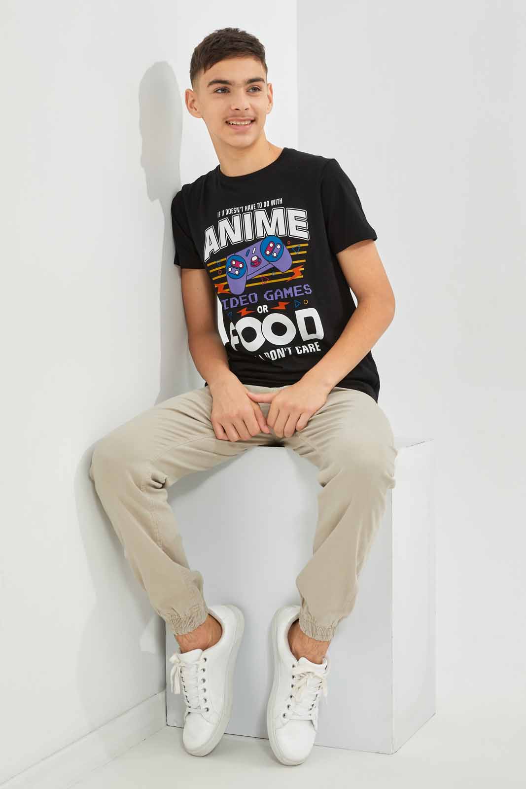 Redtag-Boys-Black-Anime-Food-And-Video-Games-Short-Sleeve-Graphic-Tee-BSR-T-Shirts,-Category:T-Shirts,-Colour:Black,-Deals:New-In,-Dept:Boys,-Filter:Senior-Boys-(8-to-14-Yrs),-New-In-BSR-APL,-Non-Sale,-S23A,-Section:Boys-(0-to-14Yrs),-TBL-Senior-Boys-9 to 14 Years