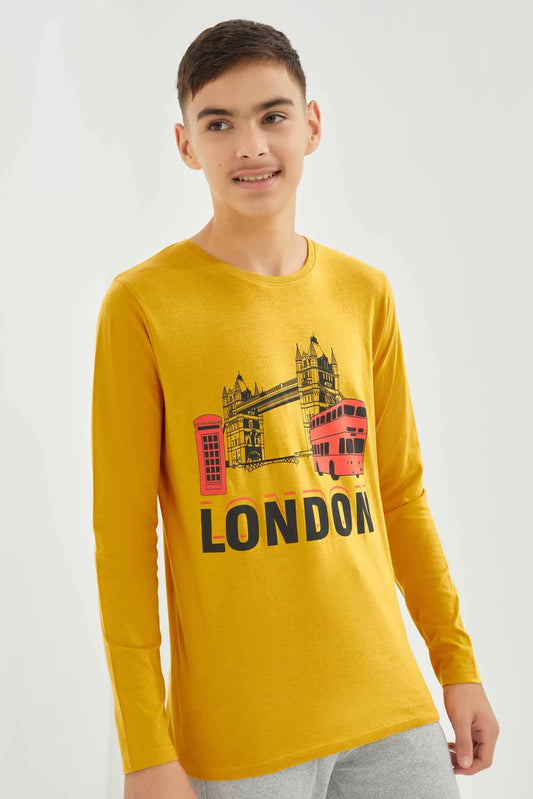 Redtag-Boys-Mustard-London-Bridge-Long-Sleeve-Graphic-Tee-BSR-T-Shirts,-Category:T-Shirts,-Colour:Mustard,-Deals:New-In,-Dept:Boys,-Filter:Senior-Boys-(8-to-14-Yrs),-New-In-BSR-APL,-Non-Sale,-S23A,-Section:Boys-(0-to-14Yrs),-TBL-Senior-Boys-9 to 14 Years