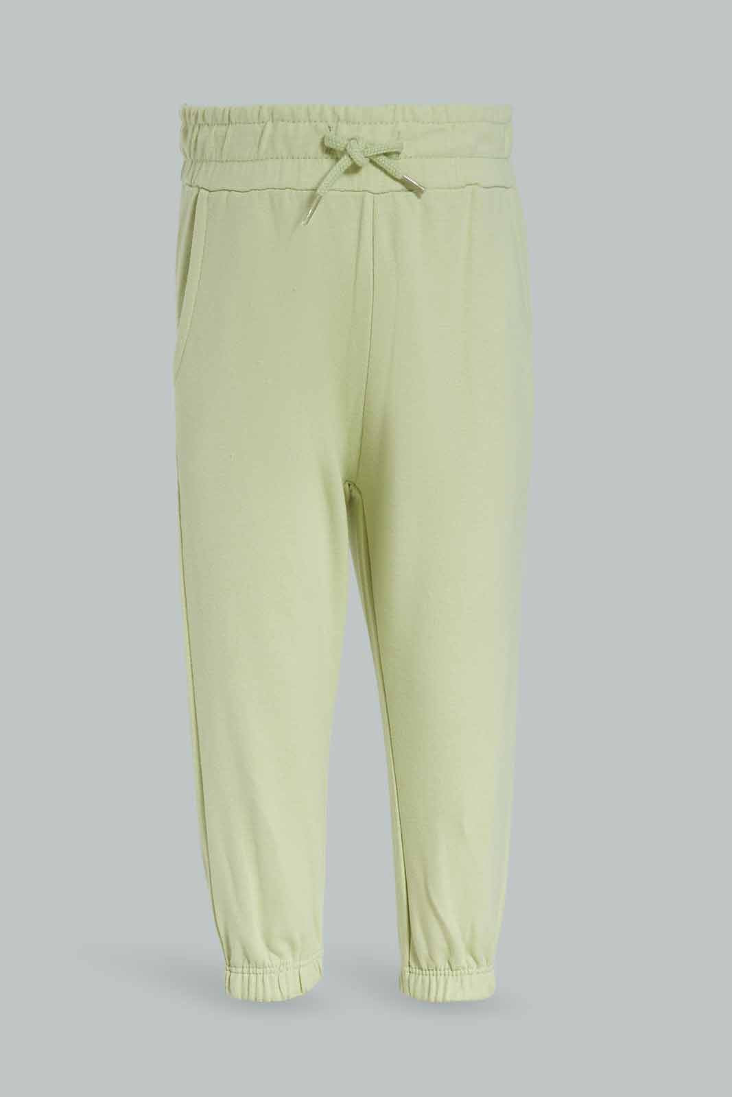 Redtag-Boys-Cream-Top-With-Green-Bottom-Dino-Aop-Crew-Jogging-Suit-Category:Jog-Sets,-Colour:Cream,-Deals:New-In,-Dept:Boys,-Filter:Infant-Boys-(3-to-24-Mths),-INB-Jog-Sets,-New-In-INB-APL,-Non-Sale,-S23A,-Section:Boys-(0-to-14Yrs)-Infant-Boys-3 to 24 Months
