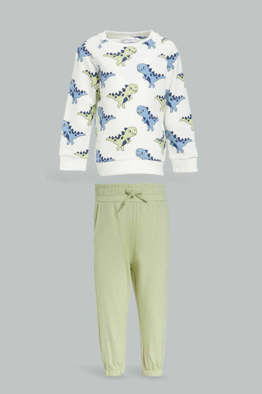 Redtag-Boys-Cream-Top-With-Green-Bottom-Dino-Aop-Crew-Jogging-Suit-Category:Jog-Sets,-Colour:Cream,-Deals:New-In,-Dept:Boys,-Filter:Infant-Boys-(3-to-24-Mths),-INB-Jog-Sets,-New-In-INB-APL,-Non-Sale,-S23A,-Section:Boys-(0-to-14Yrs)-Infant-Boys-3 to 24 Months