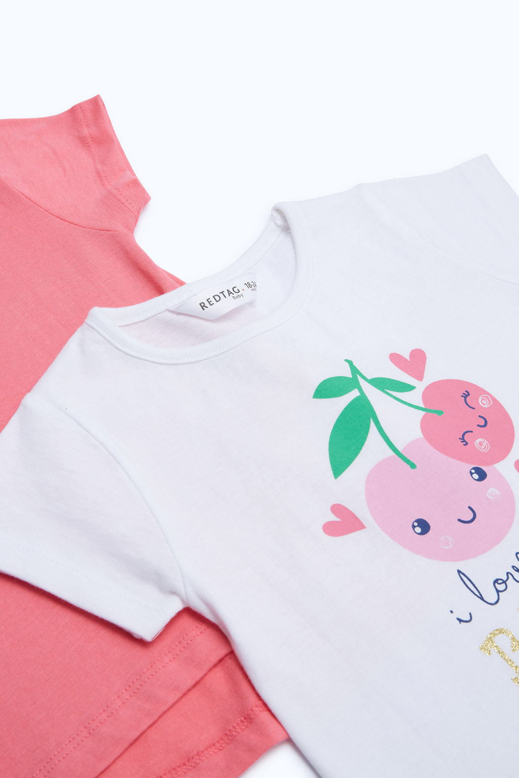 Redtag-Girls-White-&-Pink-2-Pack-T-Shitrs-Category:T-Shirts,-Colour:Assorted,-Deals:2-FOR-37,-Deals:New-In,-Dept:Girls,-Filter:Infant-Girls-(3-to-24-Mths),-H1:KWR,-H2:ING,-H3:TSH,-H4:CAT,-ING-T-Shirts,-New-In-ING-APL,-Non-Sale,-S23B,-Season:S23B,-Section:Girls-(0-to-14Yrs)-Infant-Girls-3 to 24 Months