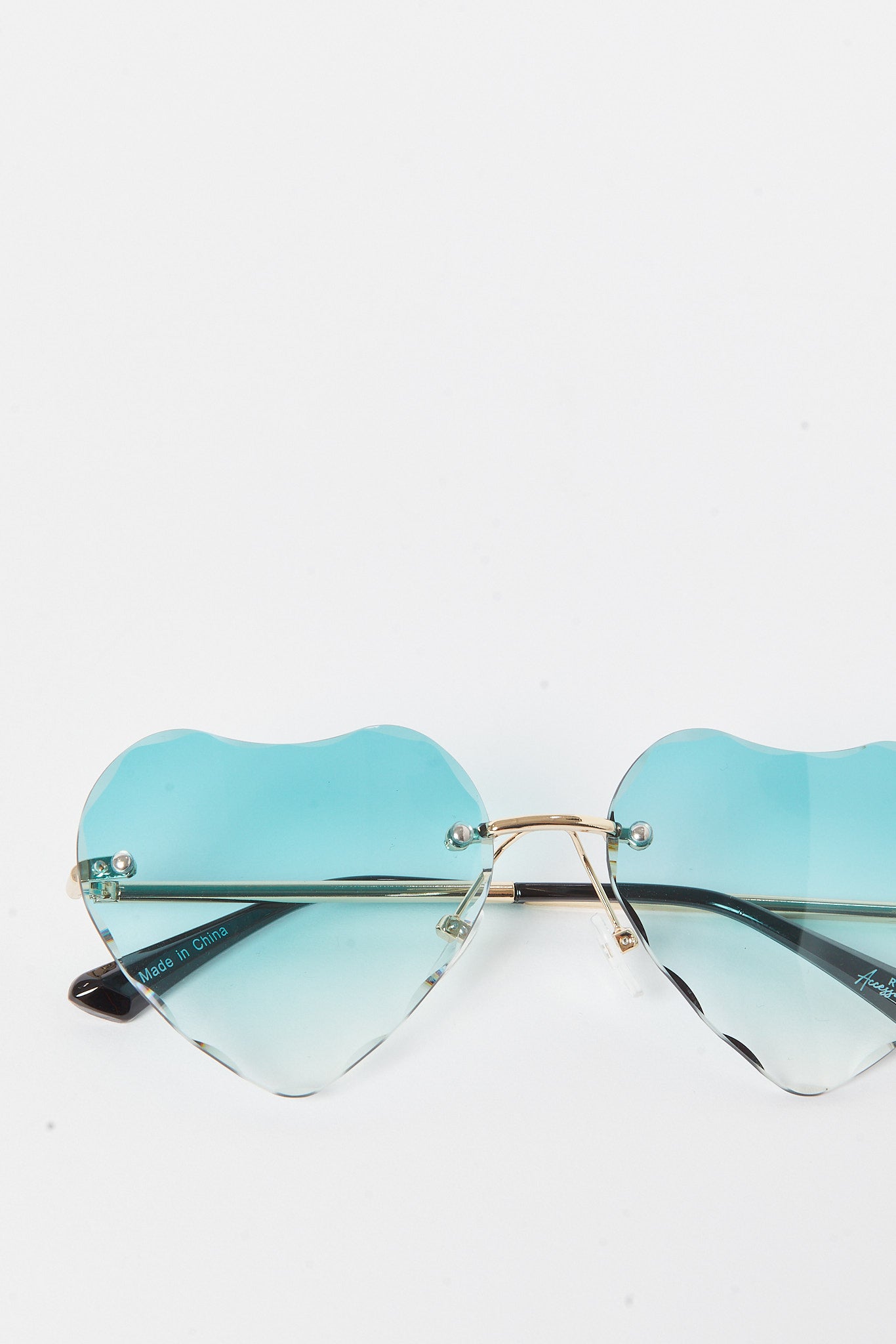 Redtag-Heart-Shaped-Embellished-Sunglasses-Category:Sunglasses,-Colour:Assorted,-Deals:New-In,-Dept:Girls,-Filter:Girls-Accessories,-GIR-Sunglasses,-New-In,-New-In-GIR-ACC,-Non-Sale,-S23A,-Section:Girls-(0-to-14Yrs)-Girls-