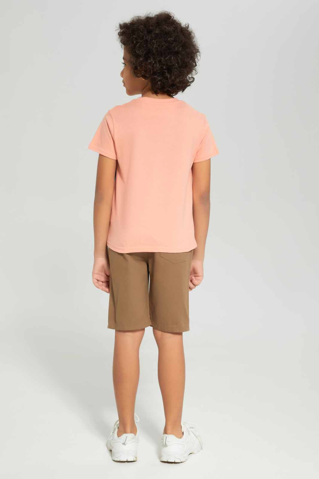 Redtag-Boys-Peach-Dino-Print-With-Spikes-With-Woven-Shorts-BOY-Sets,-Category:Sets,-Colour:Apricot,-Deals:New-In,-Dept:Boys,-Filter:Boys-(2-to-8-Yrs),-New-In-BOY-APL,-Non-Sale,-S23B,-Section:Boys-(0-to-14Yrs)-Boys-2 to 8 Years