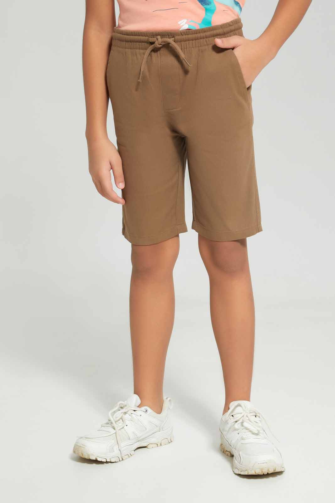 Redtag-Boys-Peach-Dino-Print-With-Spikes-With-Woven-Shorts-BOY-Sets,-Category:Sets,-Colour:Apricot,-Deals:New-In,-Dept:Boys,-Filter:Boys-(2-to-8-Yrs),-New-In-BOY-APL,-Non-Sale,-S23B,-Section:Boys-(0-to-14Yrs)-Boys-2 to 8 Years