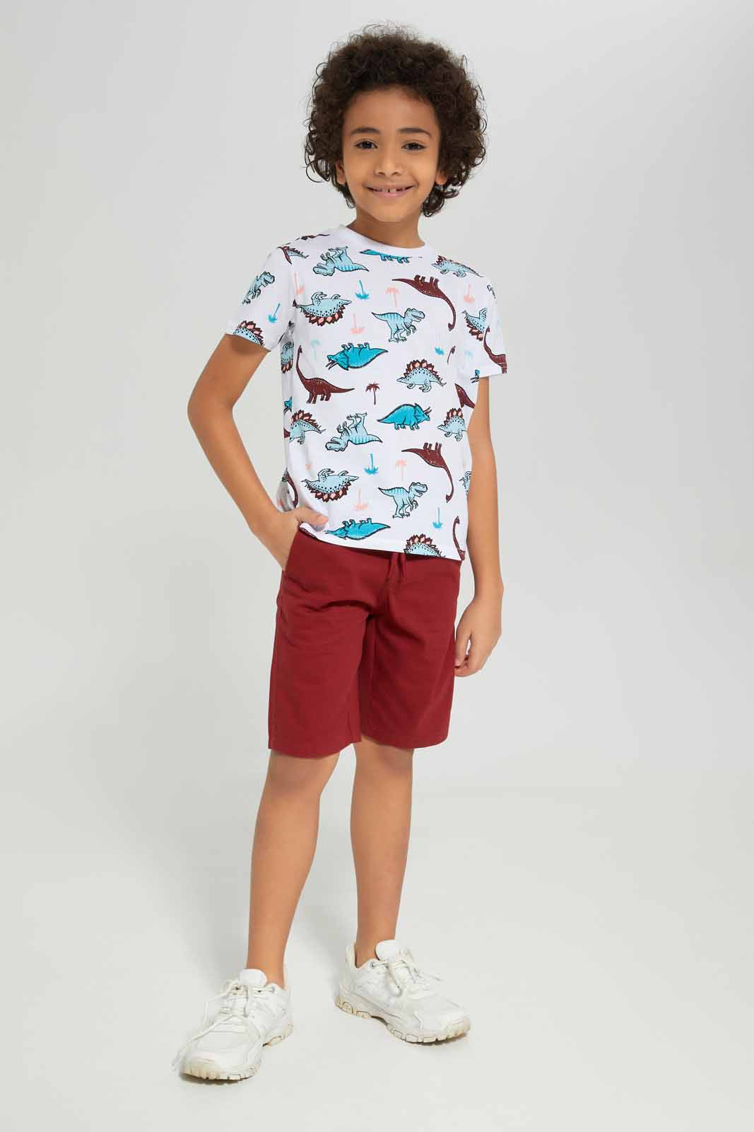 Redtag-Boys-White-Aop-Dino-With-Twill-Shorts-BOY-Sets,-Category:Sets,-Colour:White,-Deals:New-In,-Dept:Boys,-Filter:Boys-(2-to-8-Yrs),-New-In-BOY-APL,-Non-Sale,-S23B,-Section:Boys-(0-to-14Yrs)-Boys-2 to 8 Years