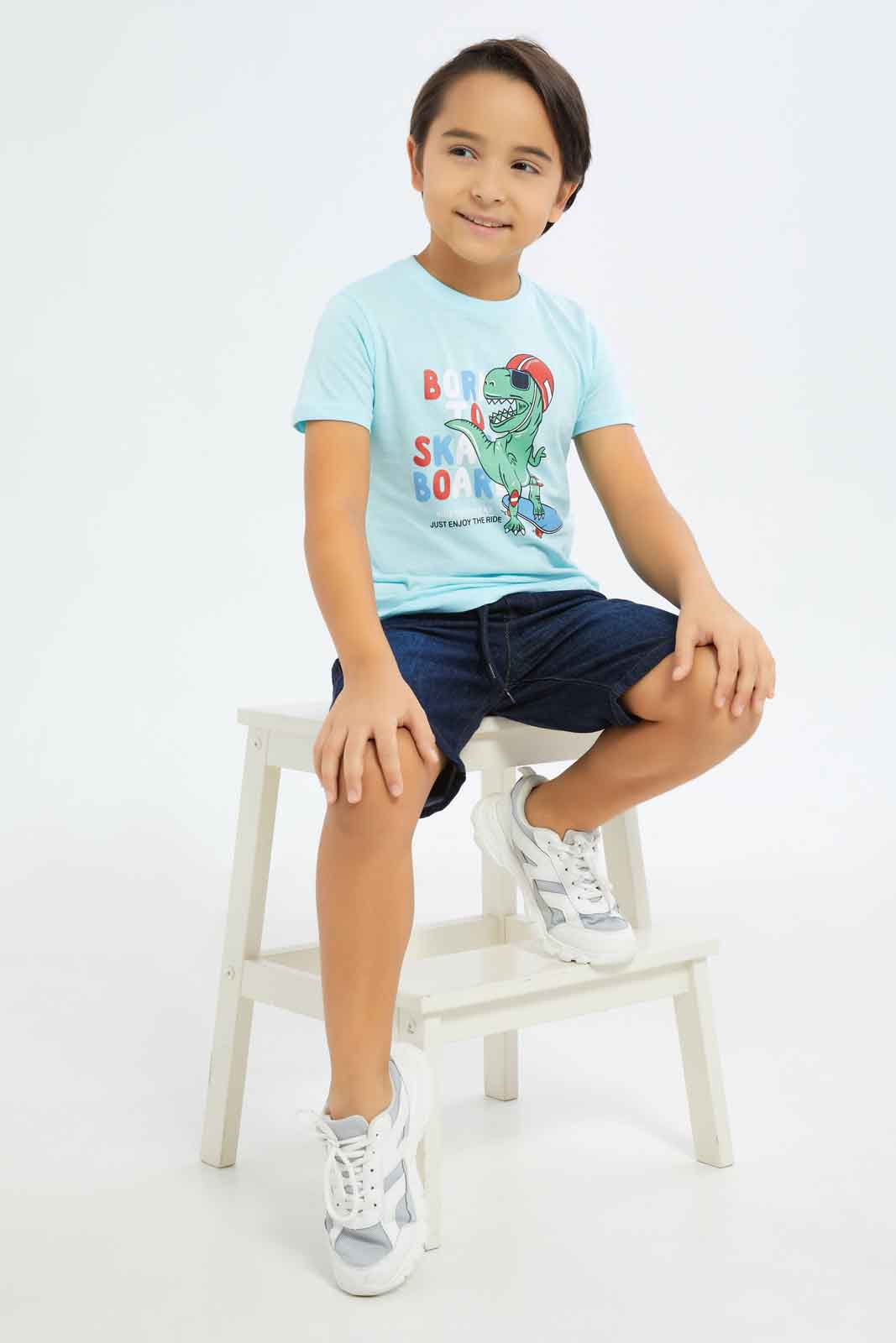 Redtag-Boys-Blue-Dinosaur-T-Shirt-With-Denim-Shorts-BOY-Sets,-Category:Sets,-Colour:Blue,-Deals:New-In,-Dept:Boys,-Filter:Boys-(2-to-8-Yrs),-New-In-BOY-APL,-Non-Sale,-S23B,-Section:Boys-(0-to-14Yrs)-Boys-2 to 8 Years