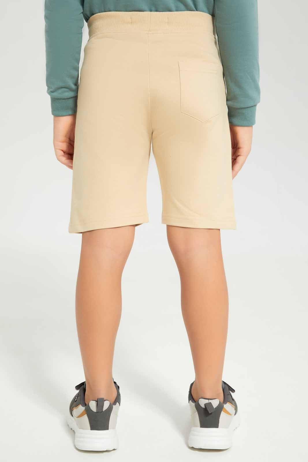 Redtag-Boys-Beige-Shorts-With-Print-BOY-Shorts,-Category:Shorts,-Colour:Beige,-Deals:New-In,-Dept:Boys,-Filter:Boys-(2-to-8-Yrs),-New-In-BOY-APL,-Non-Sale,-S23B,-Section:Boys-(0-to-14Yrs),-TBL-Boys-2 to 8 Years