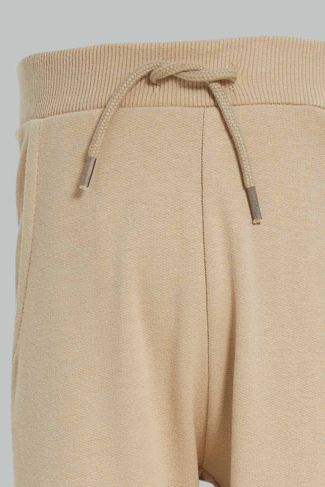 Redtag-Boys-Stone-Plain-Knit-Joggers-Category:Joggers,-Colour:Beige,-Deals:New-In,-Dept:Boys,-Filter:Infant-Boys-(3-to-24-Mths),-INB-Joggers,-New-In-INB-APL,-Non-Sale,-S23A,-Section:Boys-(0-to-14Yrs)-Infant-Boys-3 to 24 Months