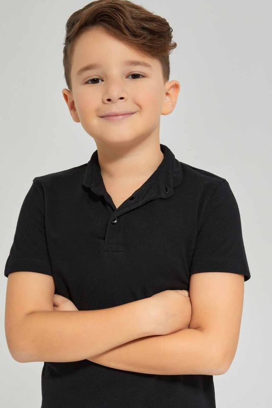 Redtag-Boys-Black-Stand-Up-Collar-Polo-Shirt-BOY-Polo-T-Shirts,-Category:Polo-T-Shirts,-Colour:Black,-Deals:New-In,-Dept:Boys,-Filter:Boys-(2-to-8-Yrs),-New-In-BOY-APL,-Non-Sale,-S23A,-Section:Boys-(0-to-14Yrs),-VLM-Boys-2 to 8 Years