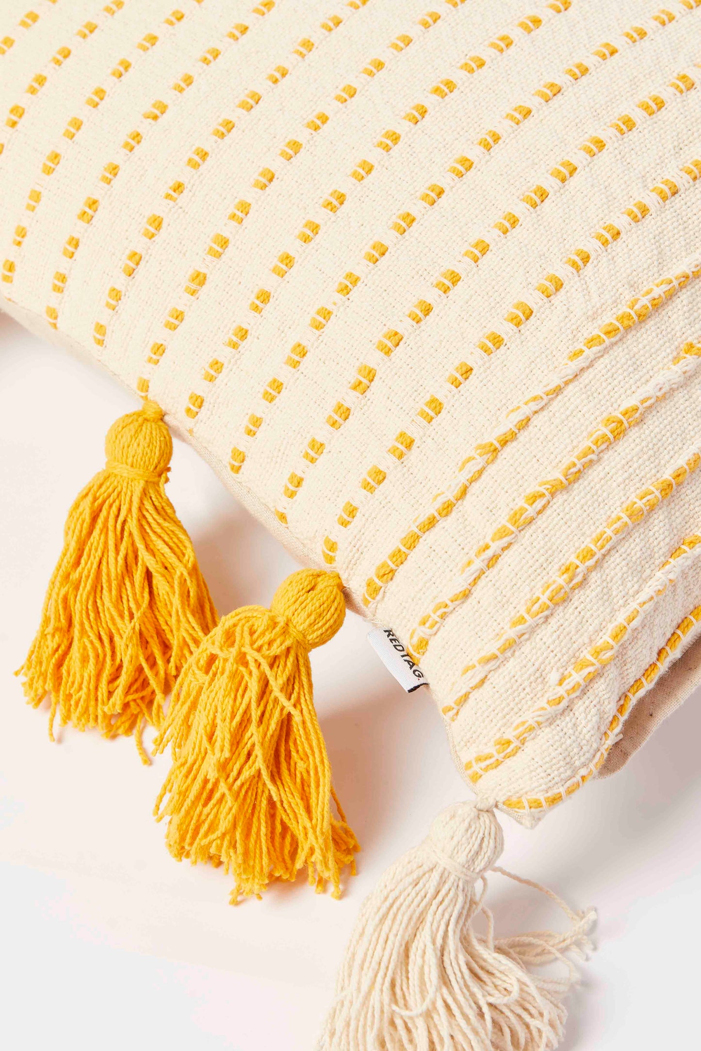 Redtag-Mustard-Woven-Cushion-With-Tassels-Category:Cushions,-Colour:Mustard,-Deals:New-In,-Dept:Home,-Filter:Home-Bedroom,-HMW-BED-Cushions,-New-In-HMW-BED,-Non-Sale,-S23A,-Section:Homewares-Home-Bedroom-