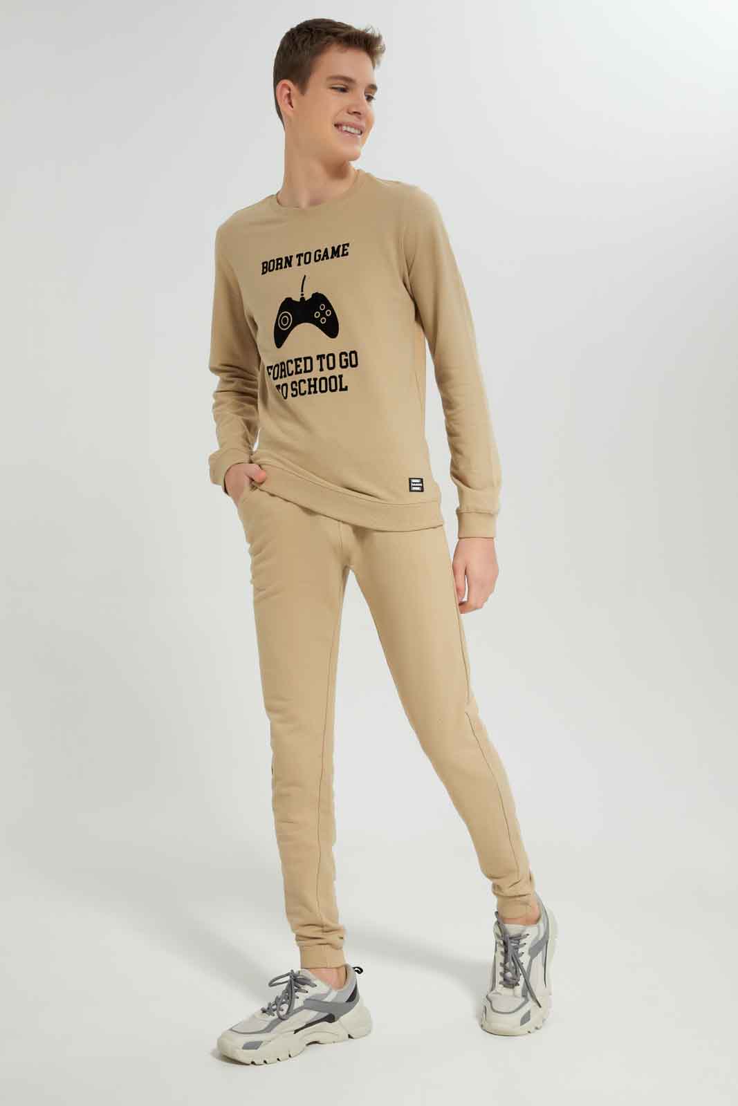 Redtag-Boys-Beige-Gamer-Jogsuit-BSR-Jog-Sets,-Category:Jog-Sets,-Colour:Beige,-Deals:New-In,-Dept:Boys,-Filter:Senior-Boys-(8-to-14-Yrs),-New-In-BSR-APL,-Non-Sale,-S23A,-Section:Boys-(0-to-14Yrs)-Senior-Boys-9 to 14 Years