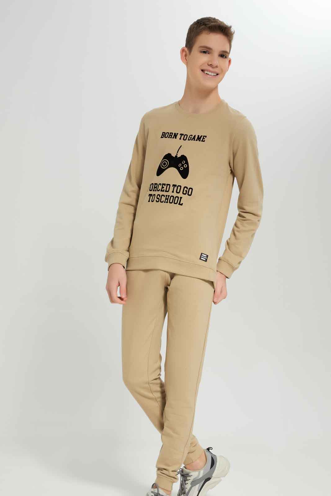 Redtag-Boys-Beige-Gamer-Jogsuit-BSR-Jog-Sets,-Category:Jog-Sets,-Colour:Beige,-Deals:New-In,-Dept:Boys,-Filter:Senior-Boys-(8-to-14-Yrs),-New-In-BSR-APL,-Non-Sale,-S23A,-Section:Boys-(0-to-14Yrs)-Senior-Boys-9 to 14 Years